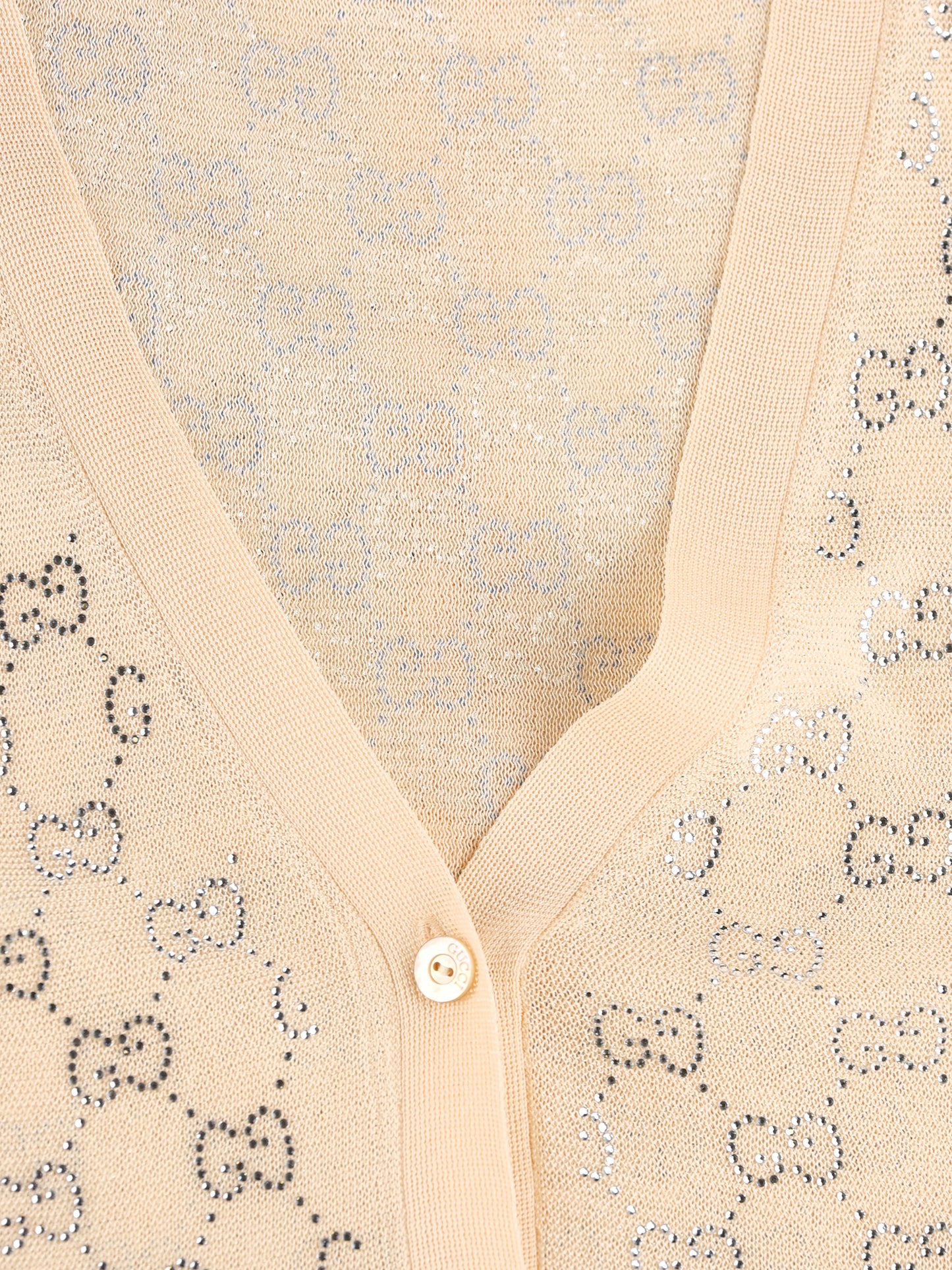 Cardigan realizzato in seta. 856133 XKFC55012 GUCCI