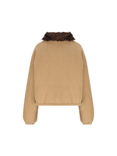 Piumino realizzato in pile. ML1147 17OQF0040 MIU MIU