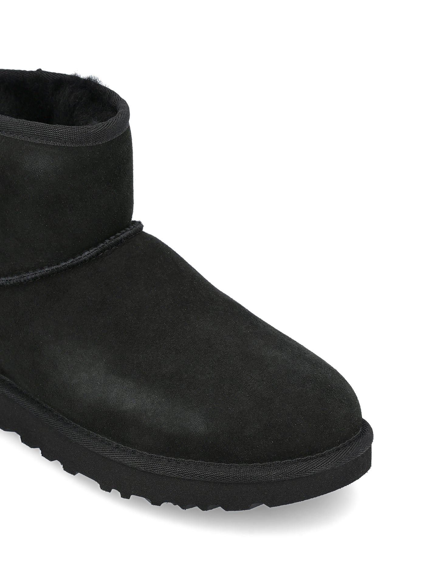 Stivali realizzati in montone e pelle. 1016222 BLK UGG