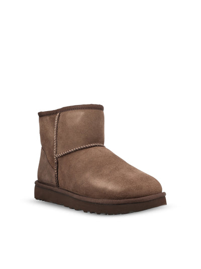 Stivali realizzati in montone e pelle. 1016222 DDC UGG
