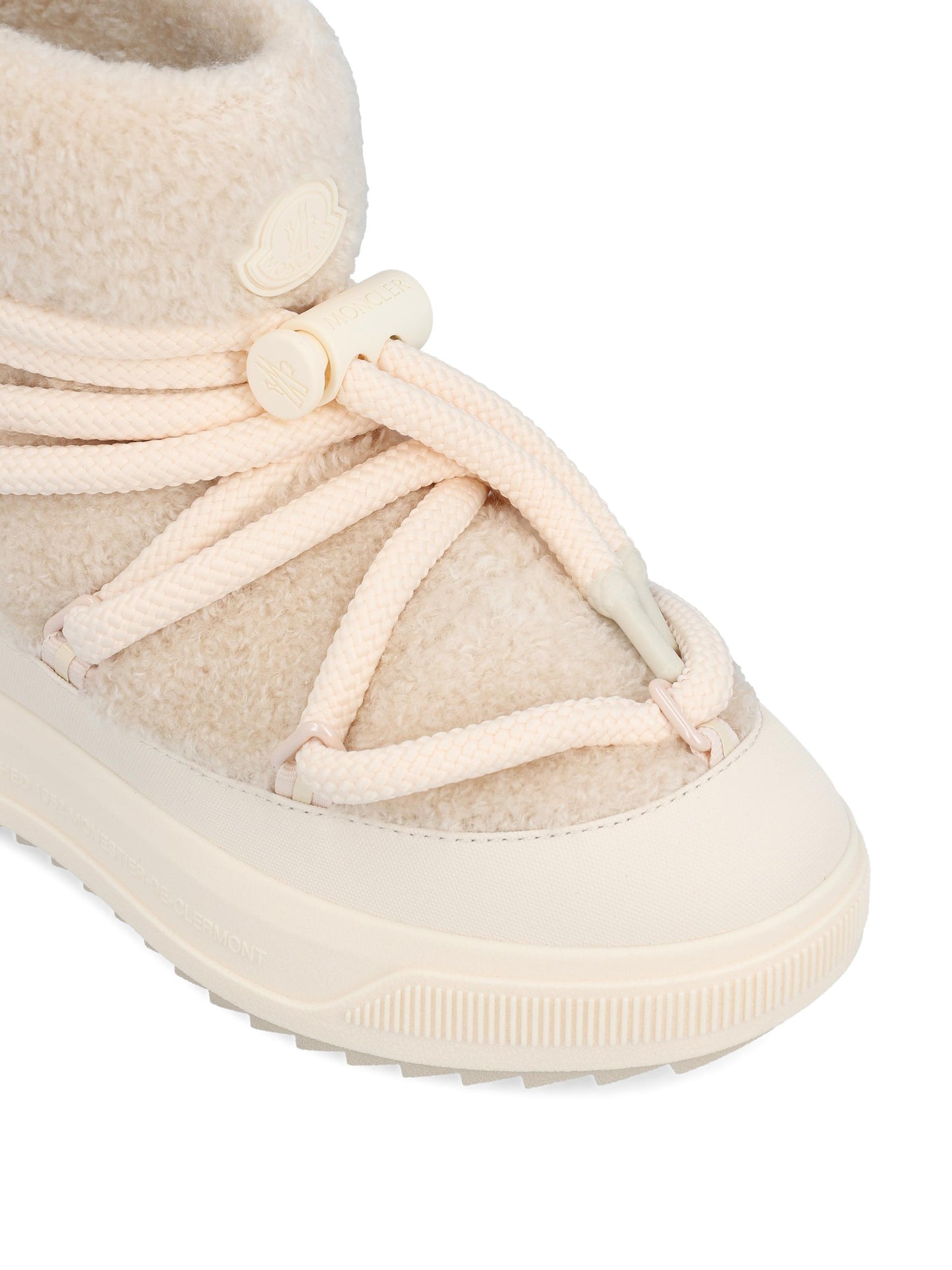 Stivali realizzati in pile effetto teddy e poliuretano. W4H00010 M945721I MONCLER