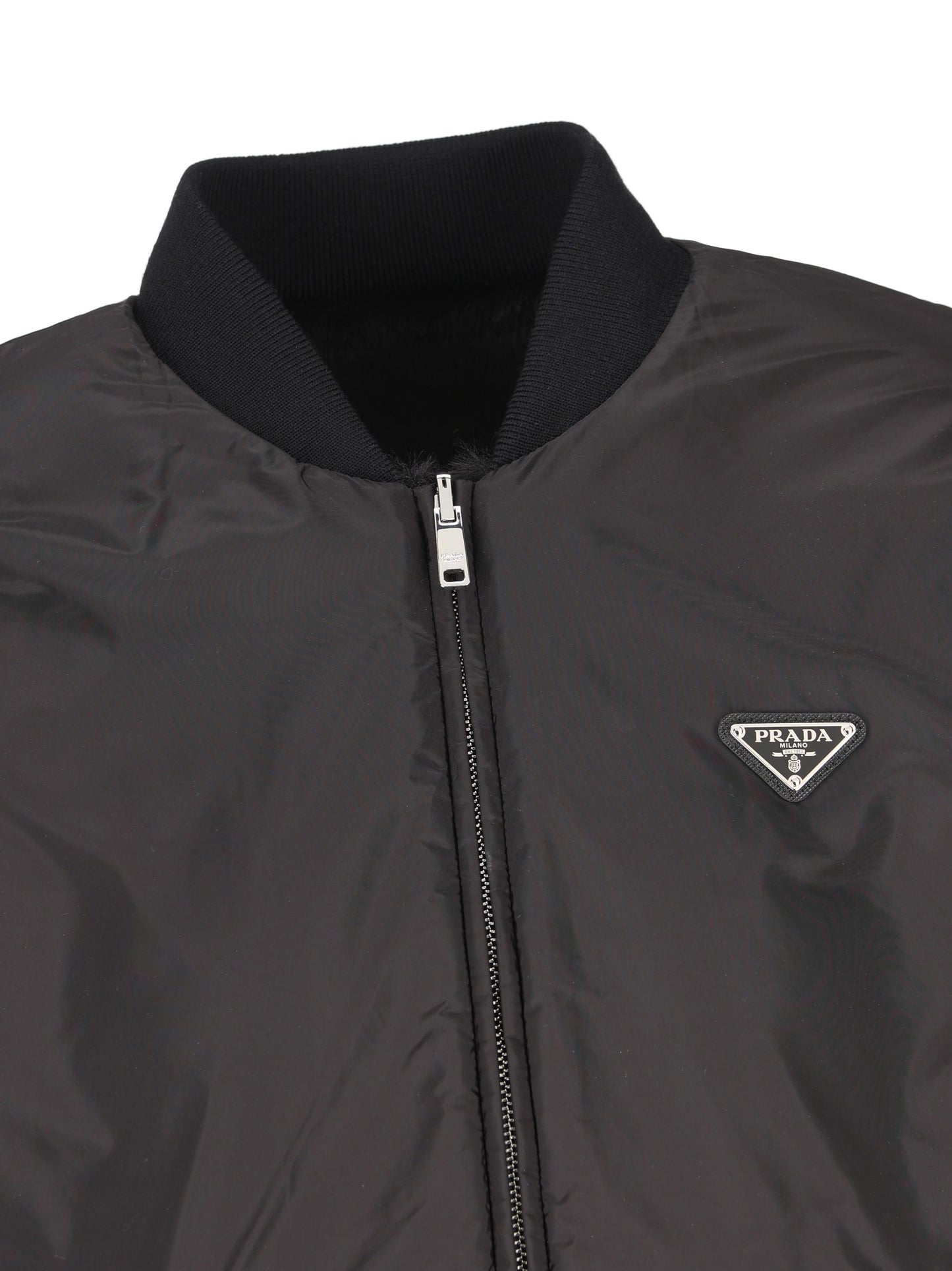 Giacca reversibile realizzata in poliestere e poliammide riciclata. PZV015 12DHF0002 PRADA