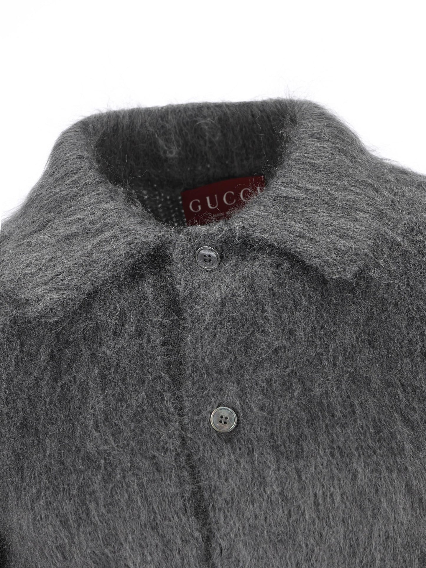 Cardigan realizzato in lana. 849729 XKE7O1087 GUCCI