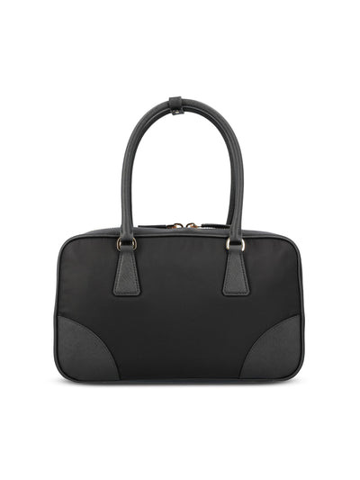 Bauletto realizzato in re-nylon e saffiano. 1BB115 R064F0002 PRADA