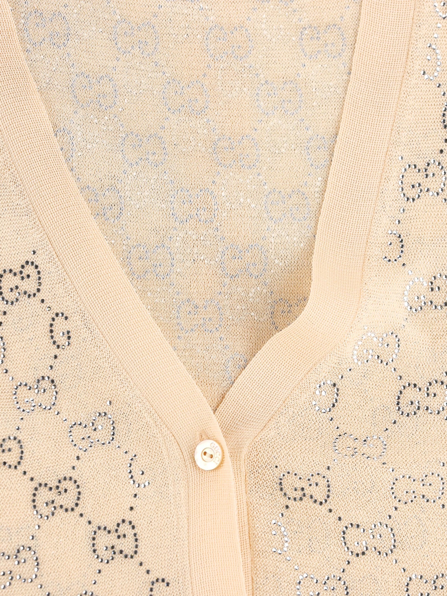 Cardigan realizzato in seta. 856133 XKFC55012 GUCCI