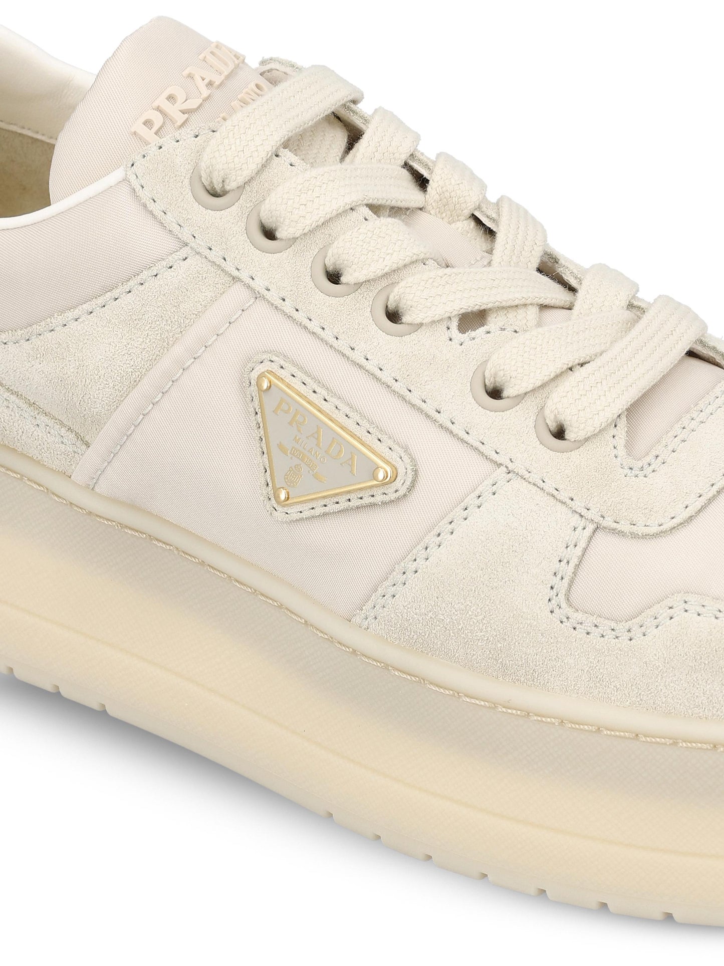 Sneakers realizzate in re-nylon e pelle scamosciata. 1E792M ZJMF0304 PRADA