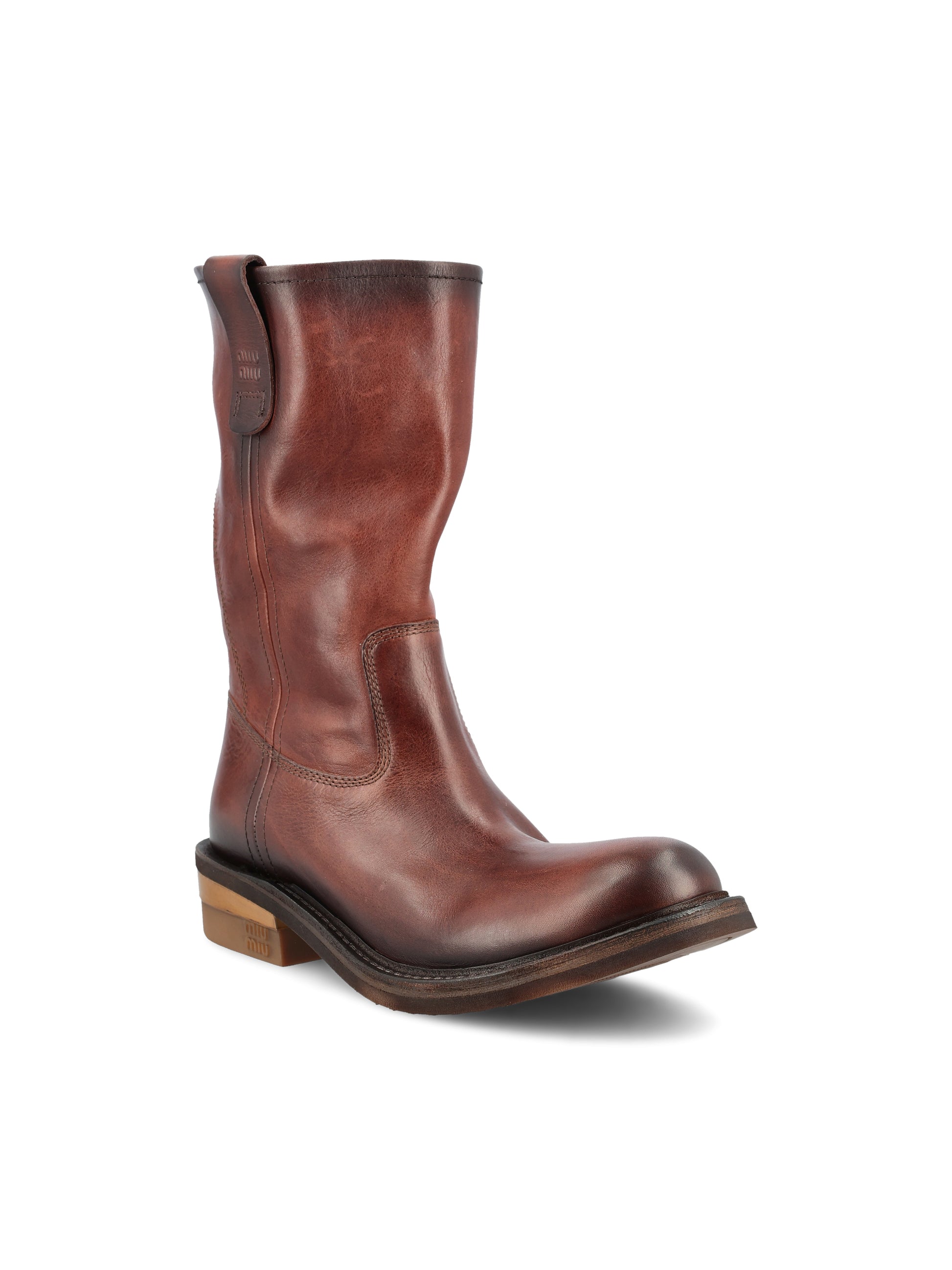Stivali realizzati in pelle di vitello. 5U680E 5ODF0201 MIU MIU 