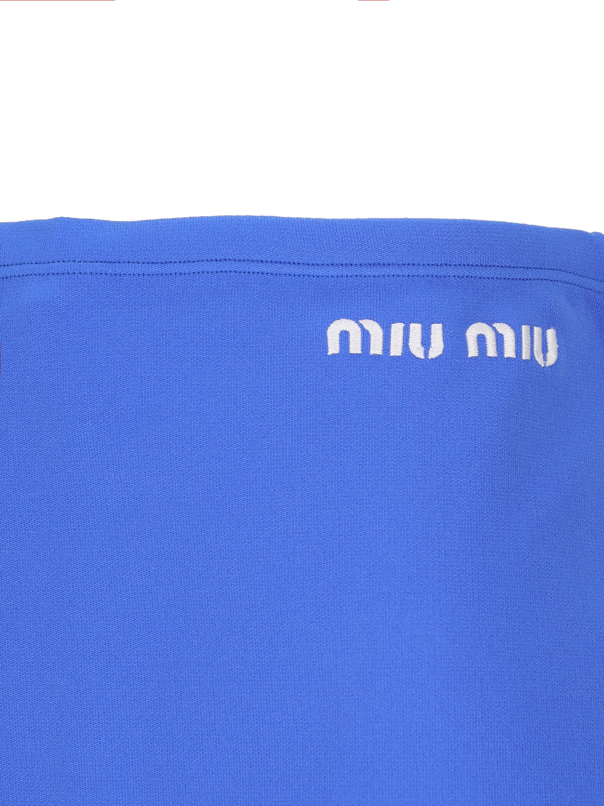 Minigonna realizzata in poliammide riciclata. MMG584 148OF0Q0U MIU MIU 