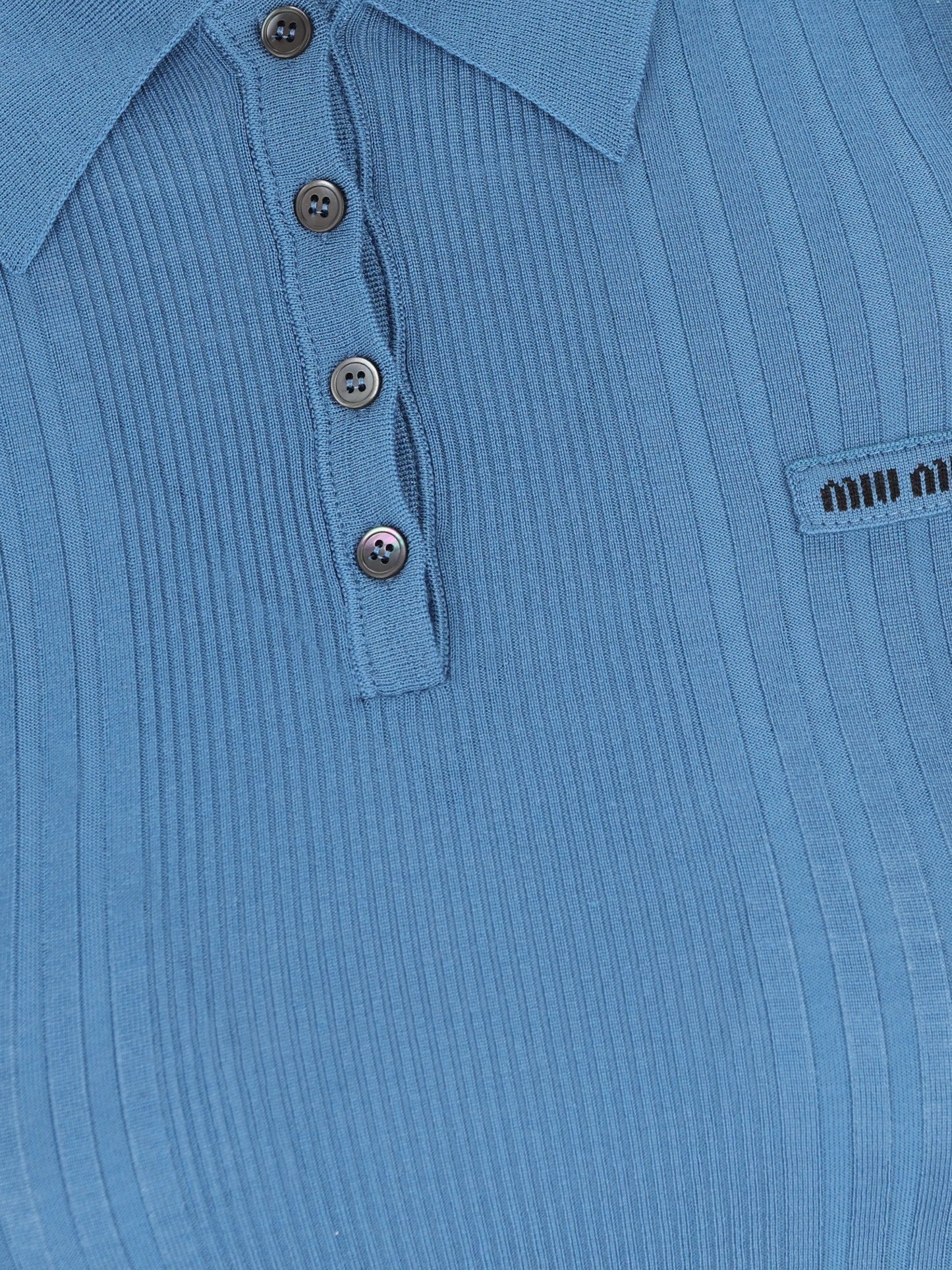 Polo realizzata in lana vergine. MML02B 18TWF0154 MIU MIU 