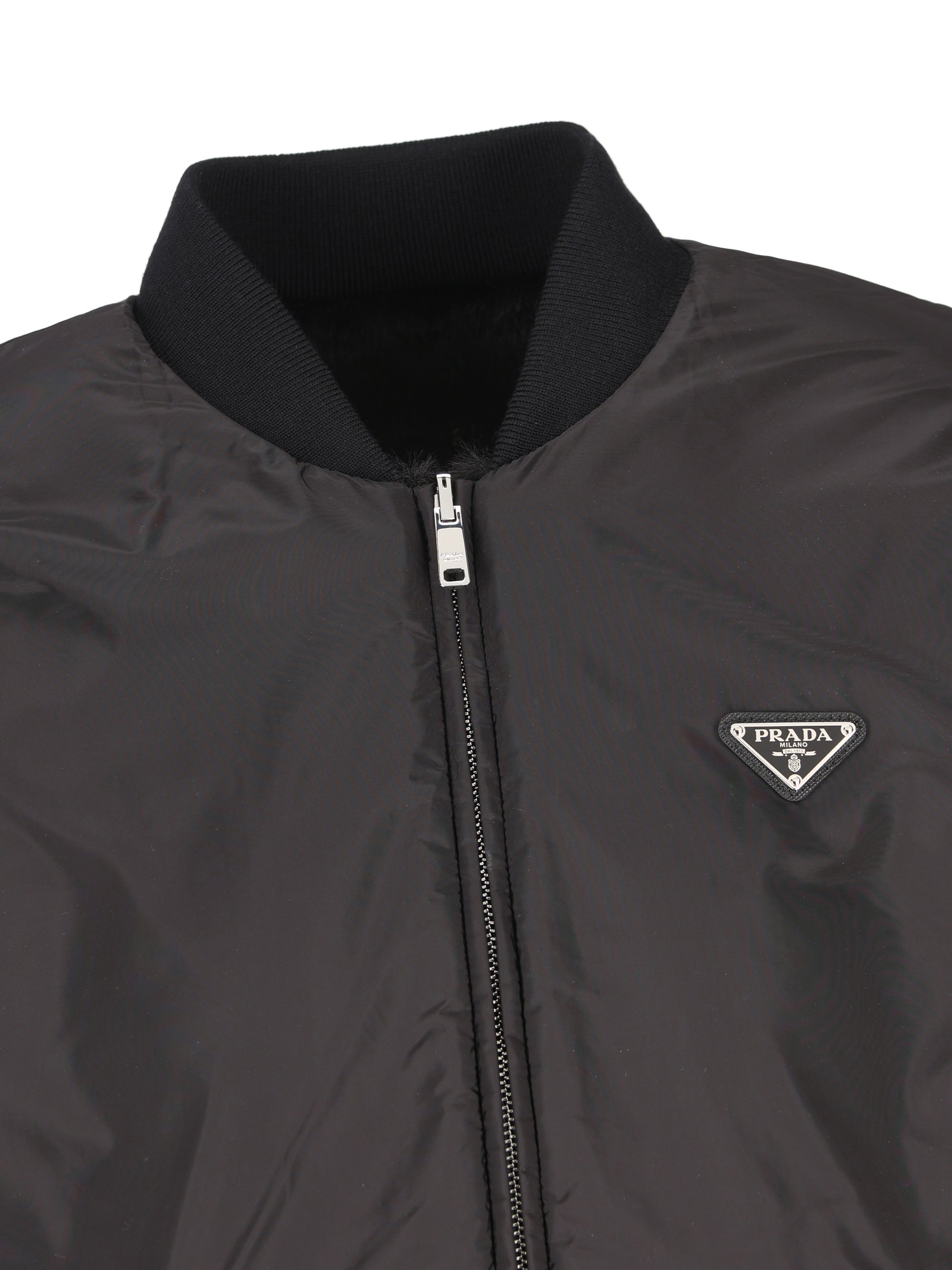 Giacca reversibile realizzata in poliestere e poliammide riciclata. PZV015 12DHF0002 PRADA 