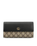 Portafoglio realizzato in pelle e tessuto. 456116 AAE5E1069 GUCCI 