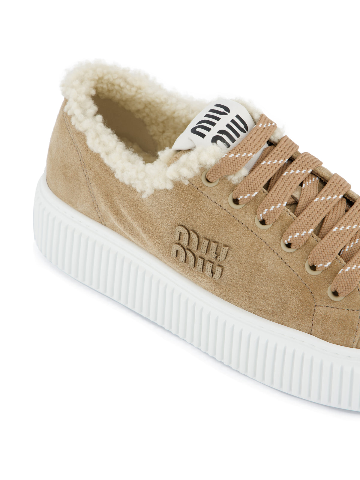 Sneakers realizzate in pelle scamosciata. 5E389E Z0GF0F24 MIU MIU 