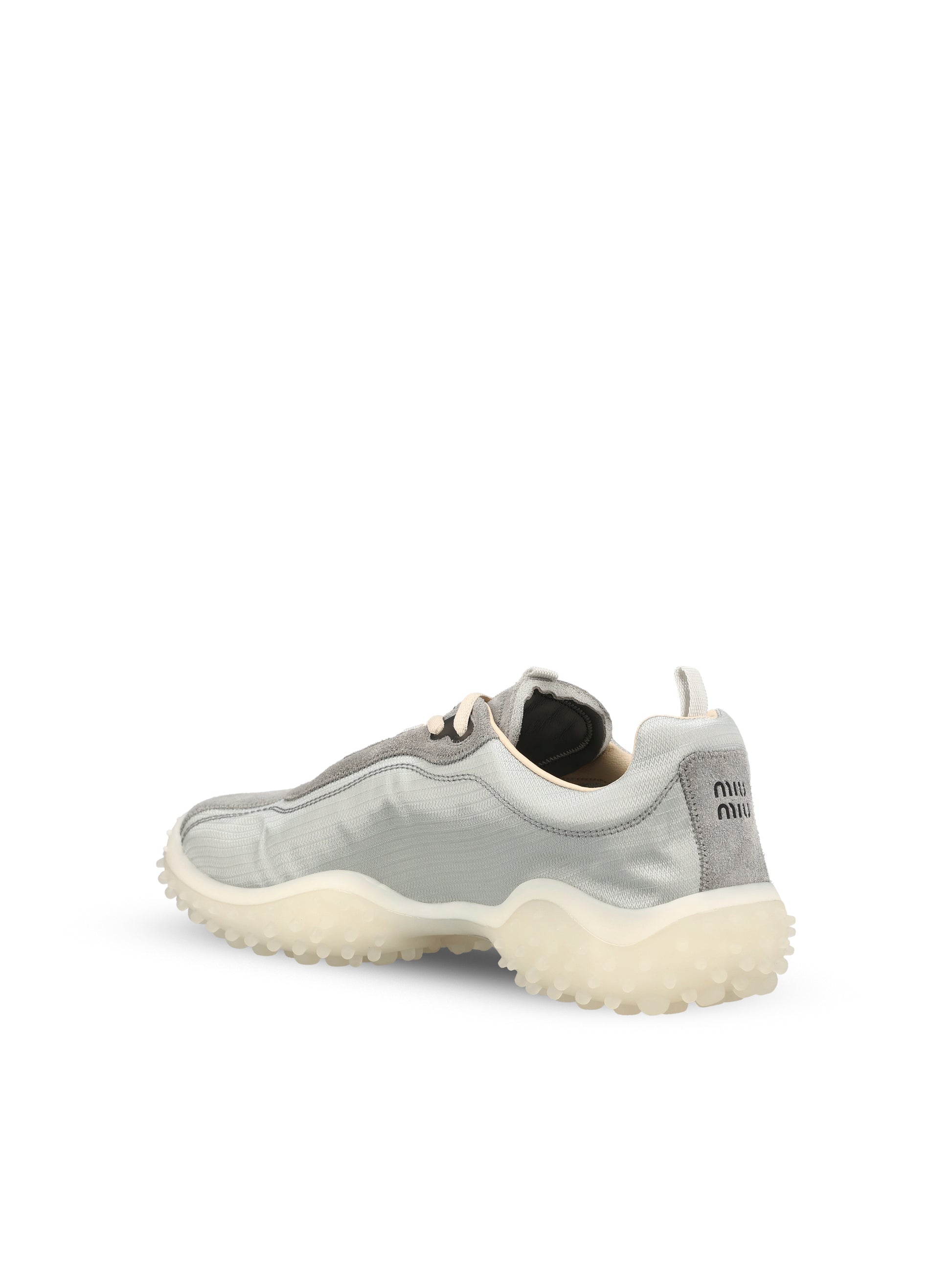 Sneakers realizzate in tessuto e cuoio. 5E806E 3M0KF0424 MIU MIU 