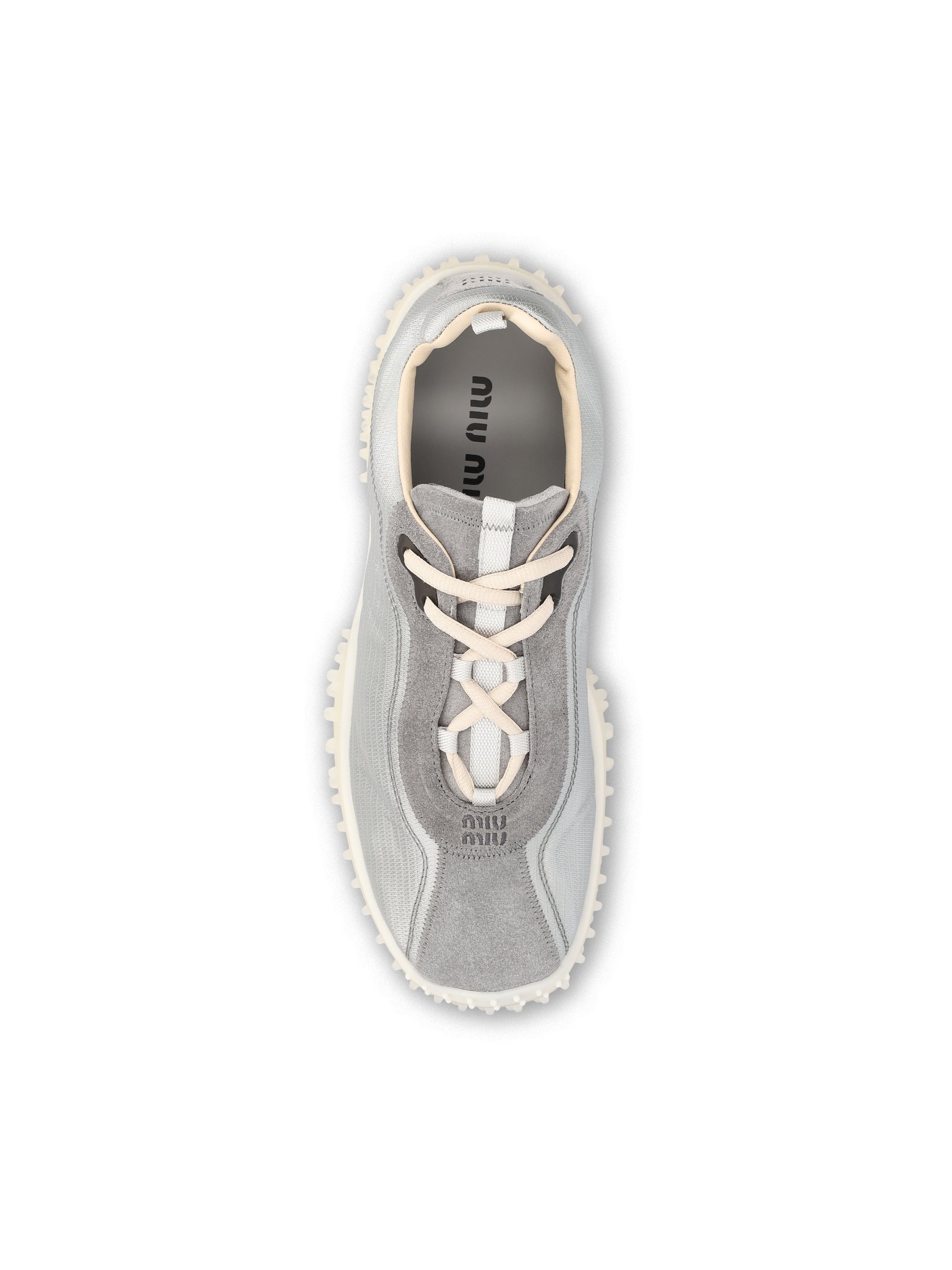 Sneakers realizzate in tessuto e cuoio. 5E806E 3M0KF0424 MIU MIU 