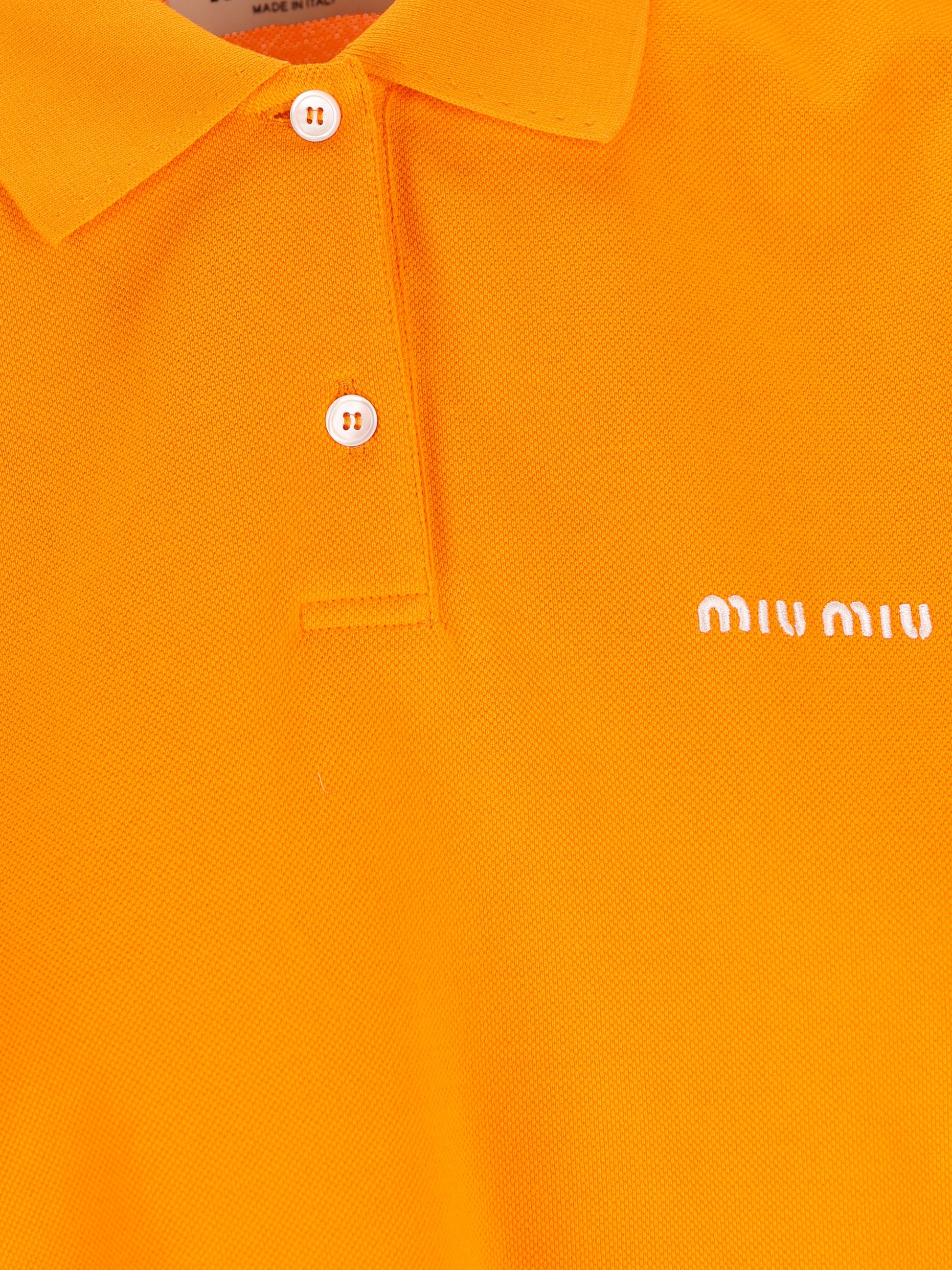 Polo realizzata in cotone. MJN535 14RWF0049 MIU MIU 
