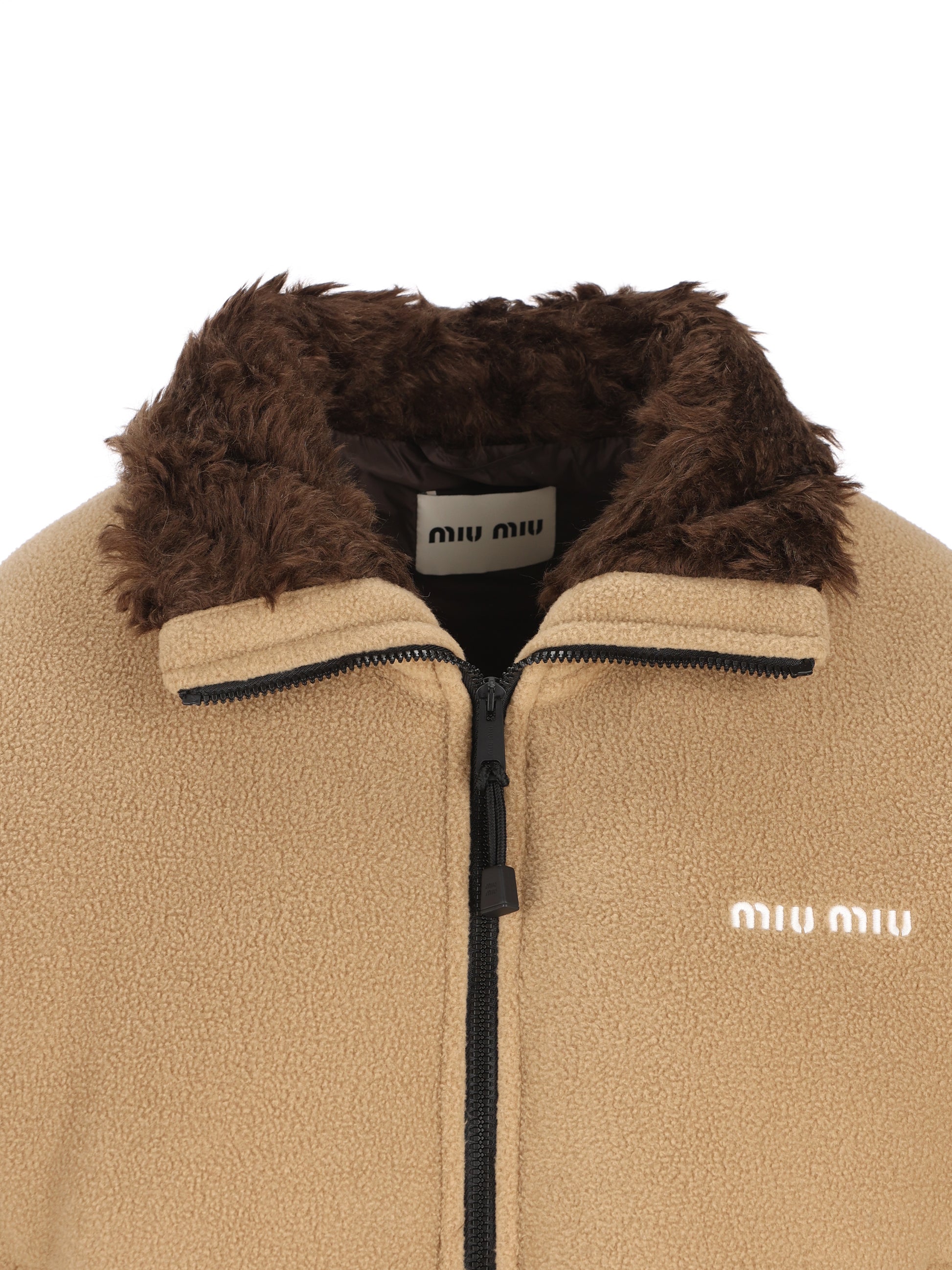Piumino realizzato in pile. ML1147 17OQF0040 MIU MIU 