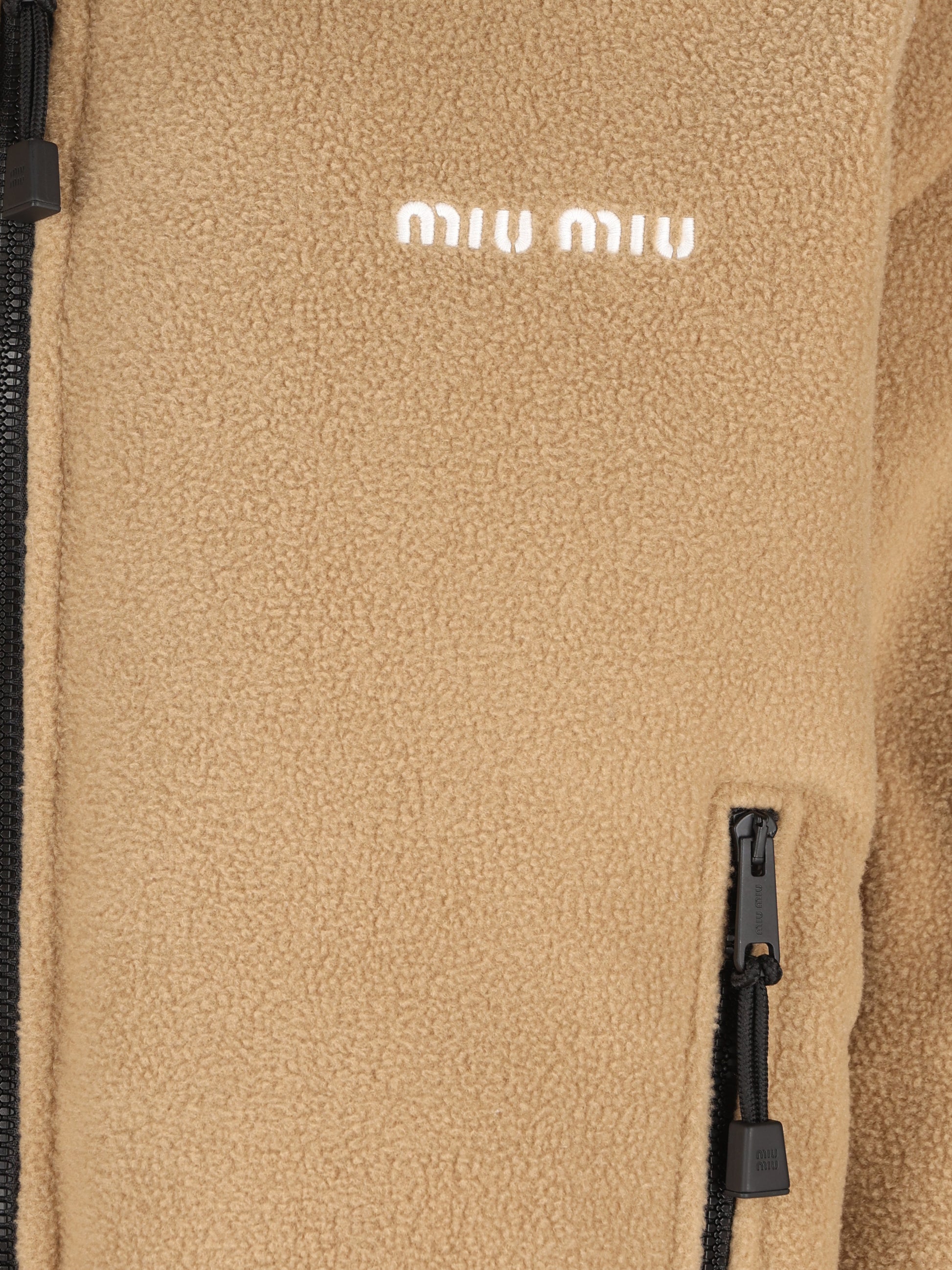 Piumino realizzato in pile. ML1147 17OQF0040 MIU MIU 