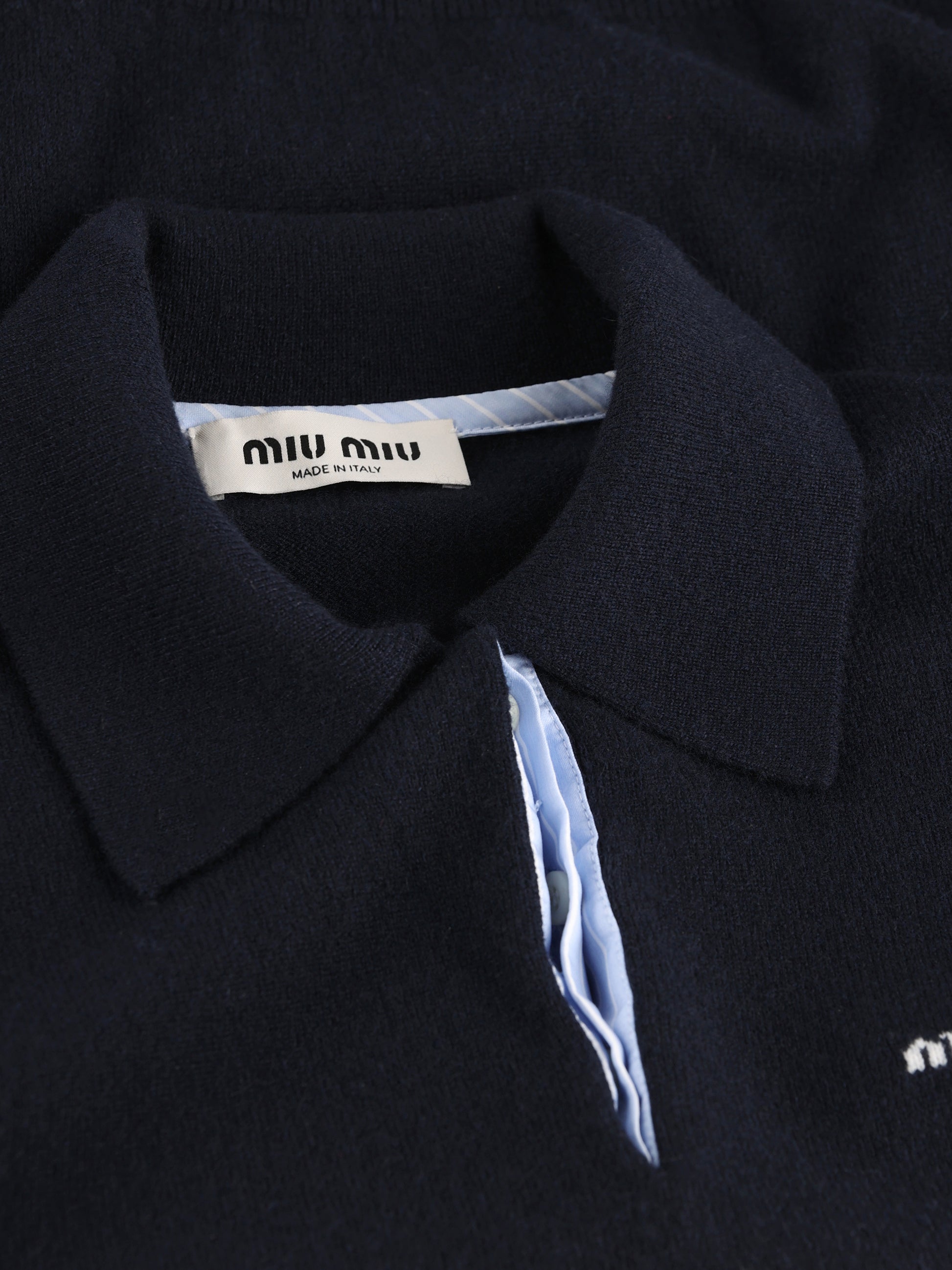 Polo realizzata in cashmere. MMLA20 15Z1F0008 MIU MIU 