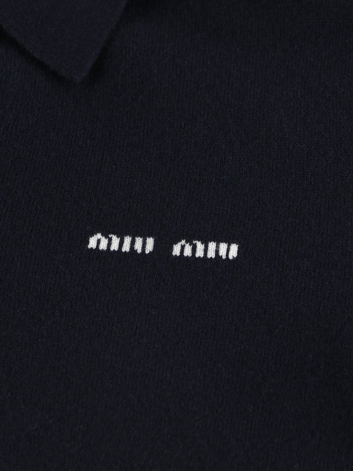 Polo realizzata in cashmere. MMLA20 15Z1F0008 MIU MIU 