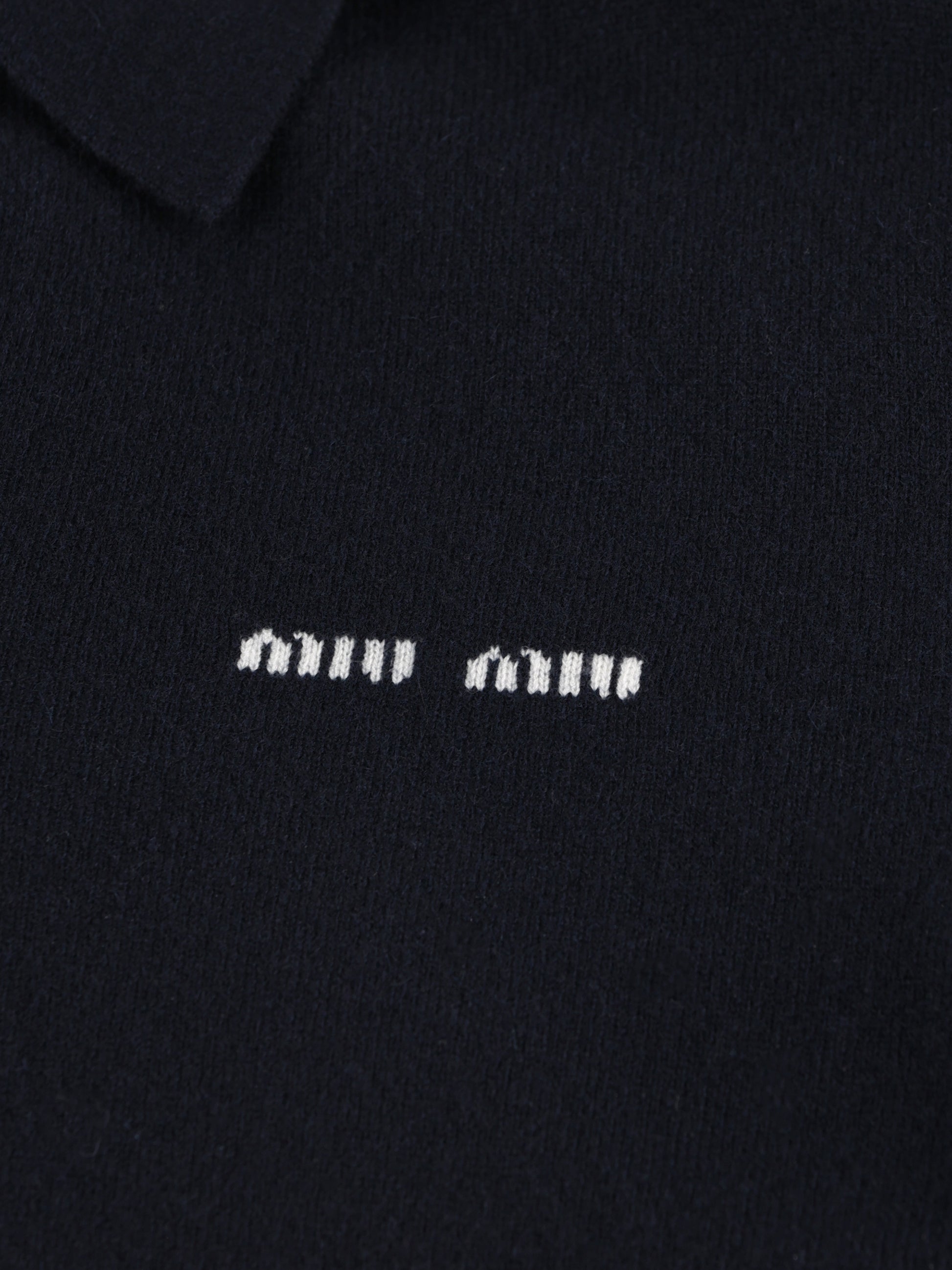Polo realizzata in cashmere. MMLA20 15Z1F0008 MIU MIU 