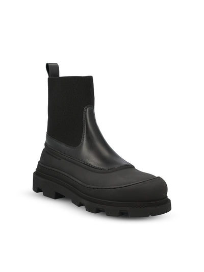 Stivaletti realizzati in pelle e gomma. W4F00030 M9918999 MONCLER 