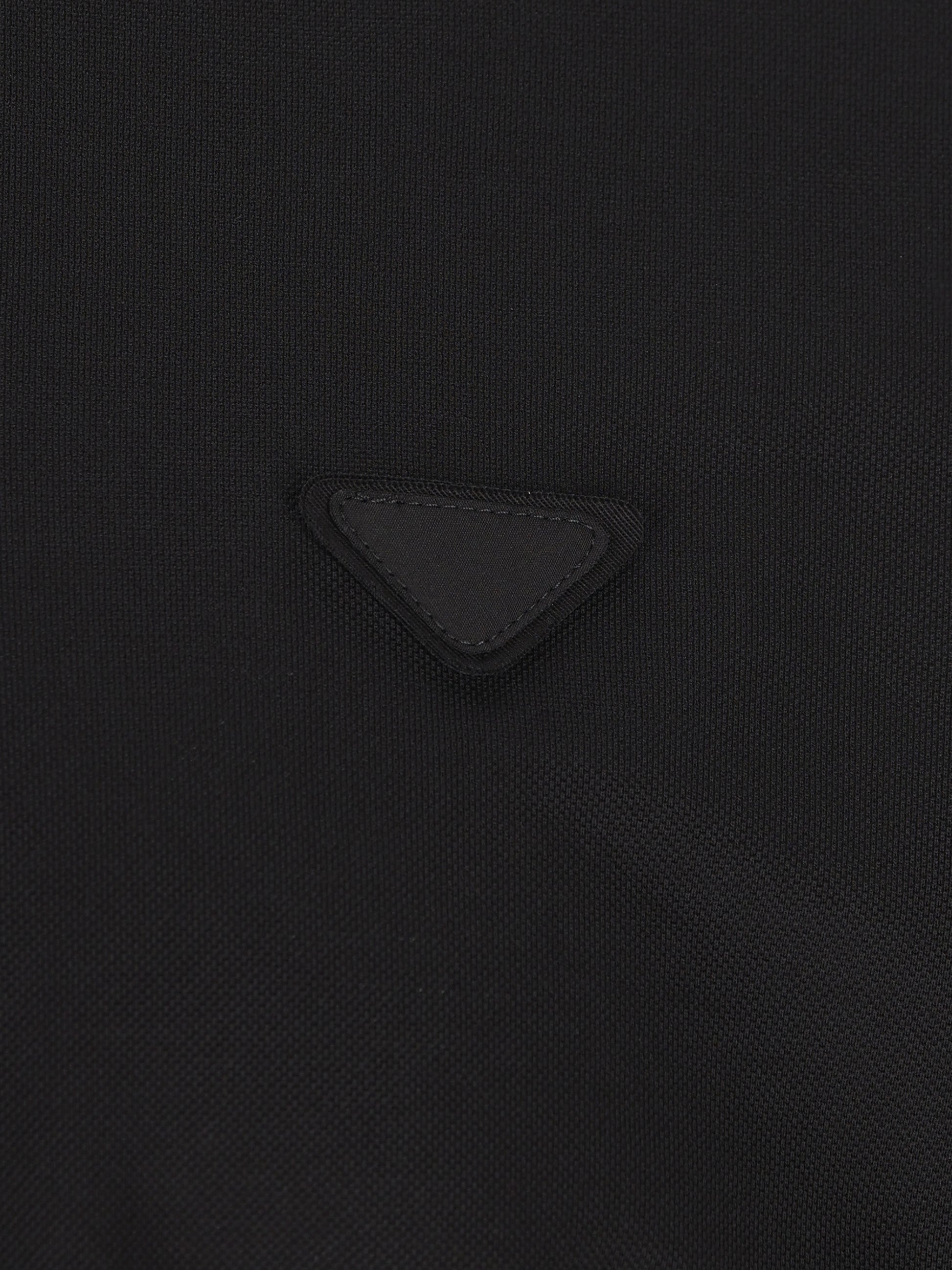 Polo realizzata in cotone. UJN444 1867F0002 PRADA 