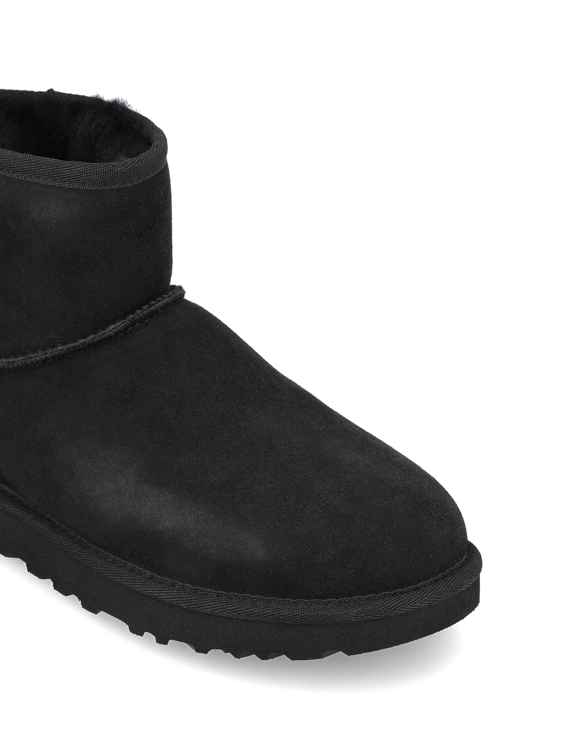 Stivali realizzati in montone e pelle. 1016222 BLK UGG 