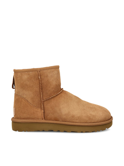 Stivali realizzati in montone e pelle. 1016222 CHE UGG 