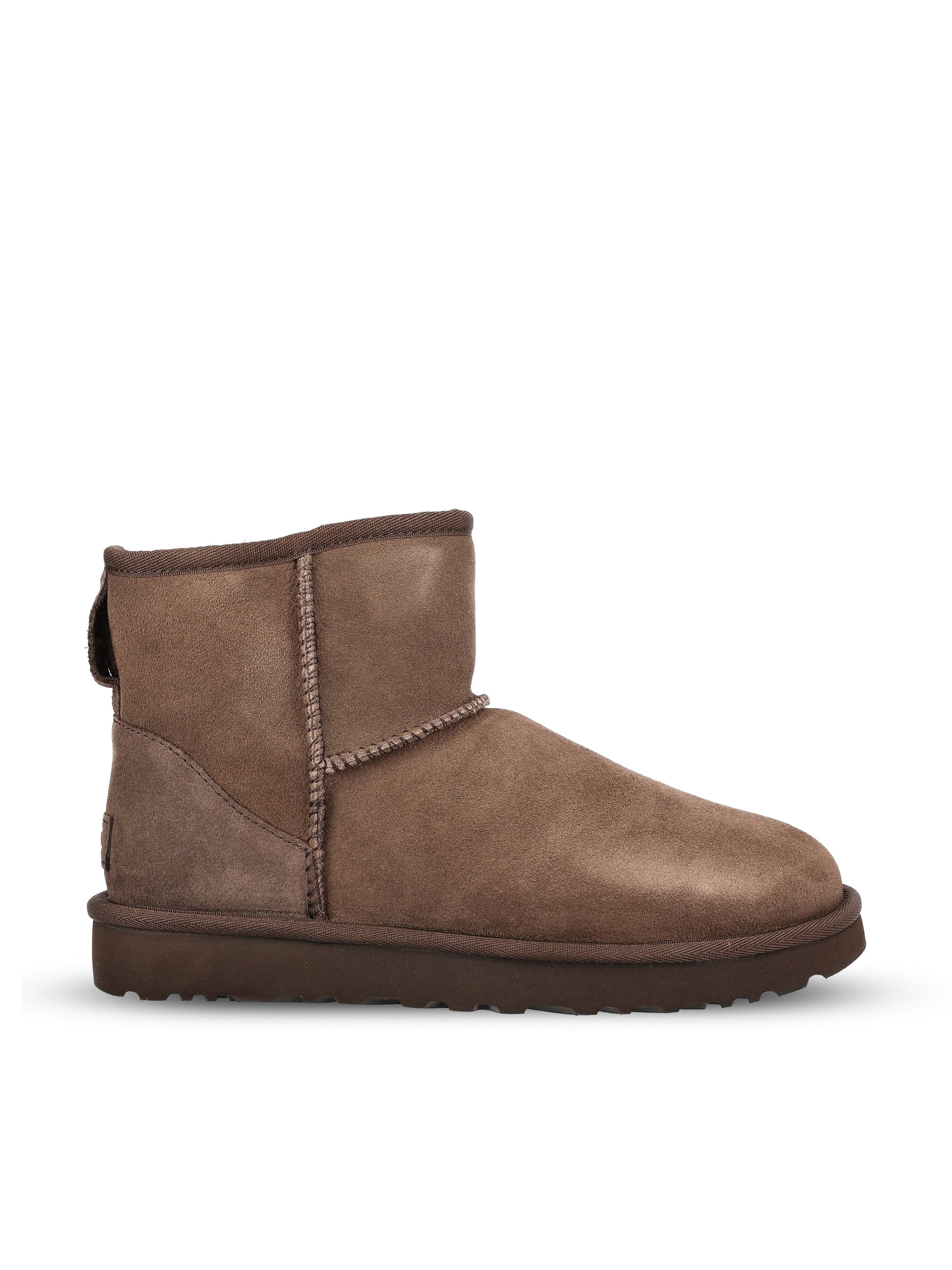 Stivali realizzati in montone e pelle. 1016222 DDC UGG 