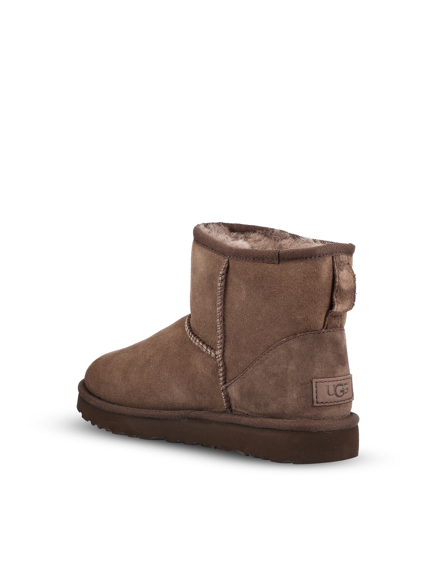 Stivali realizzati in montone e pelle. 1016222 DDC UGG 