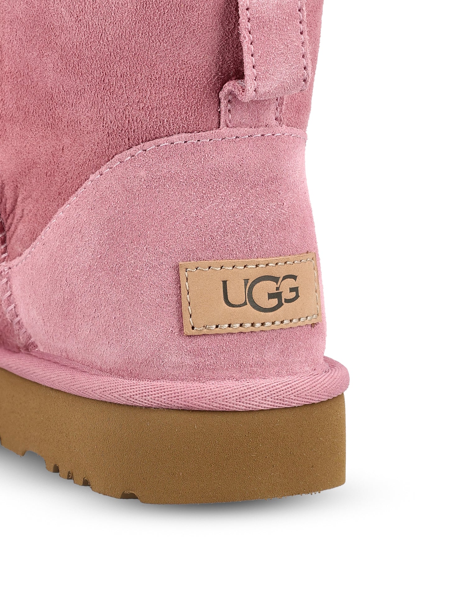 Stivali realizzati in montone e pelle. 1016222 DYR UGG 