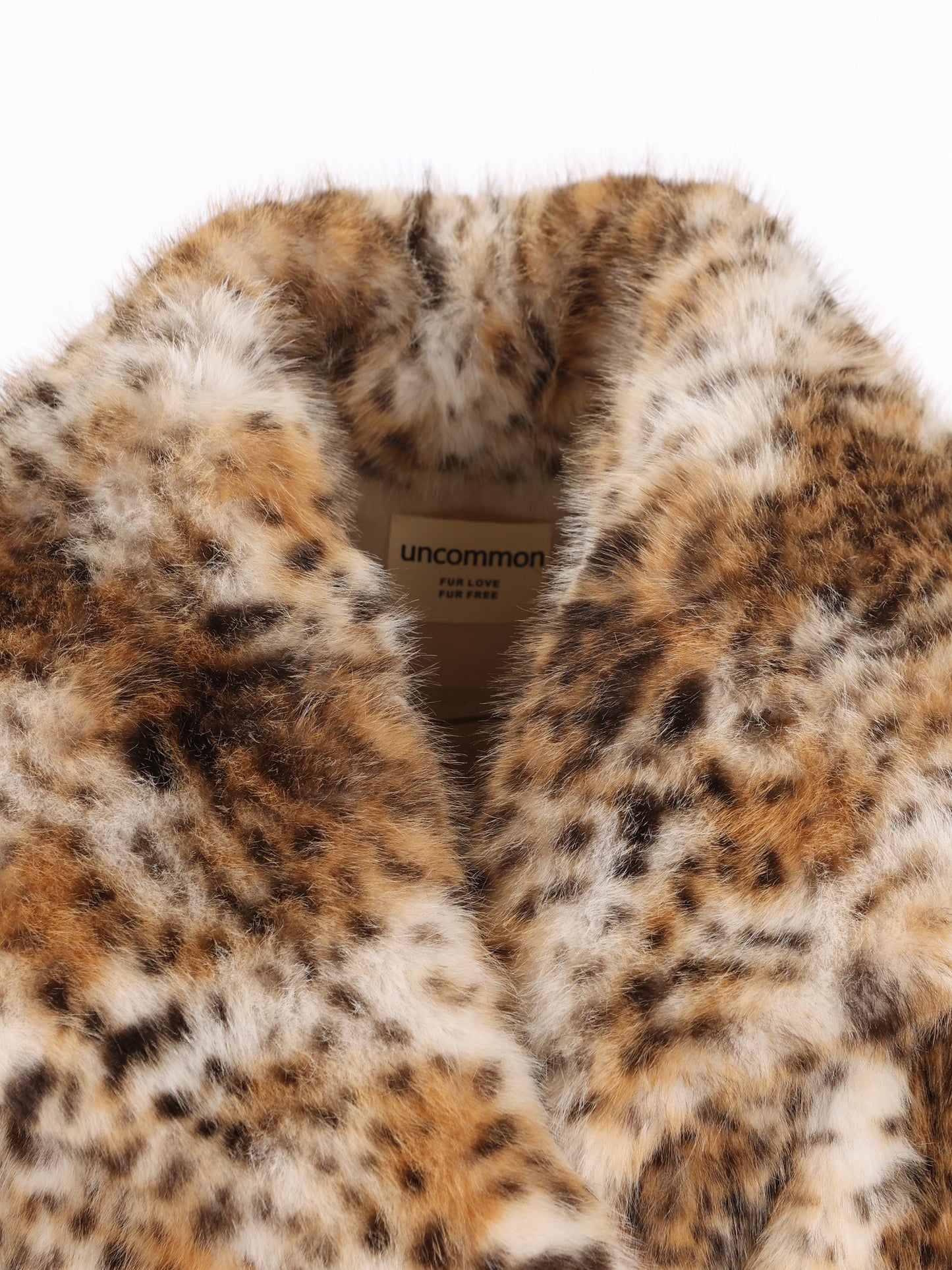 Cappotto realizzato in poliestere EF312/LPT 000 UNCOMMON 