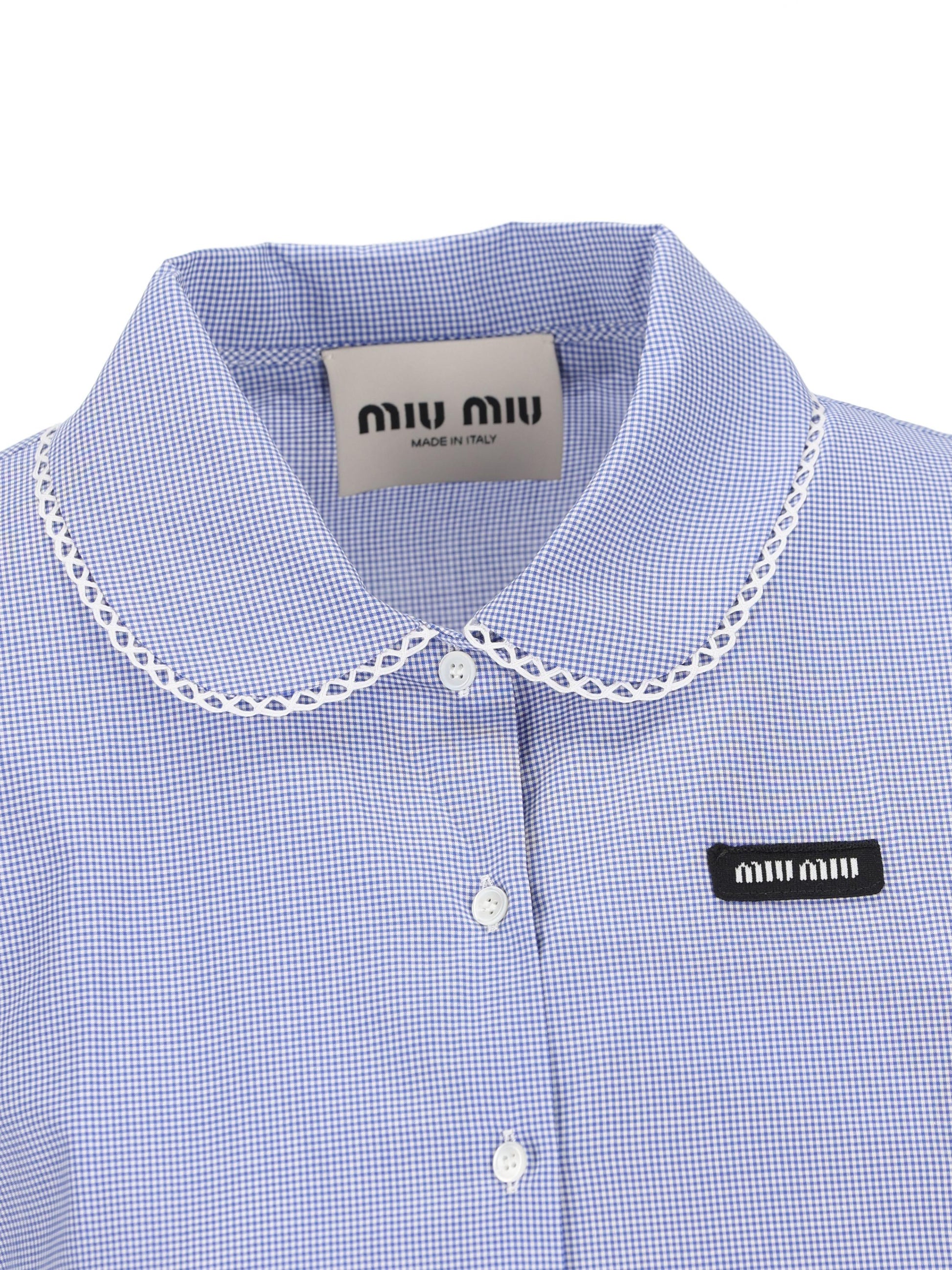 Abito realizzato in cotone. MF6203 187GF0AZ1 MIU MIU 