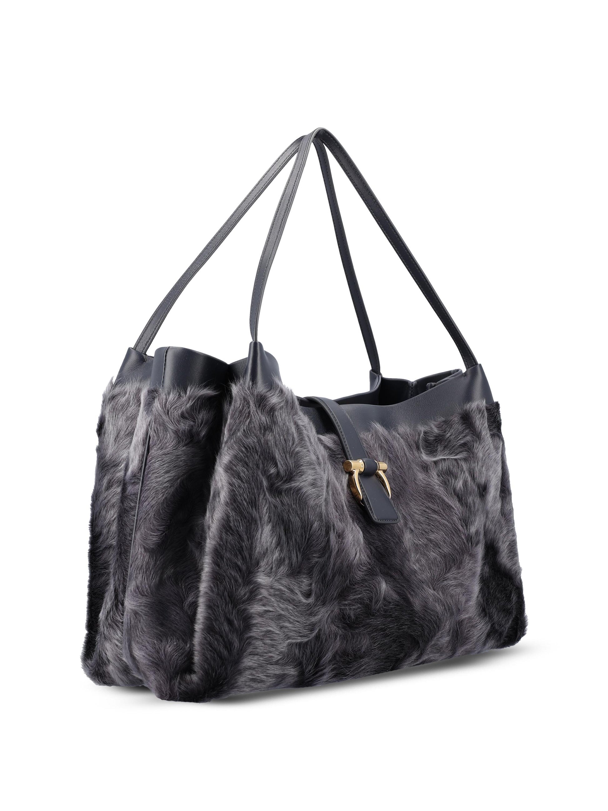 Tote bag realizzata in shearling di capretto e vitello. 21A437 787988002 SALVATORE FERRAGAMO 
