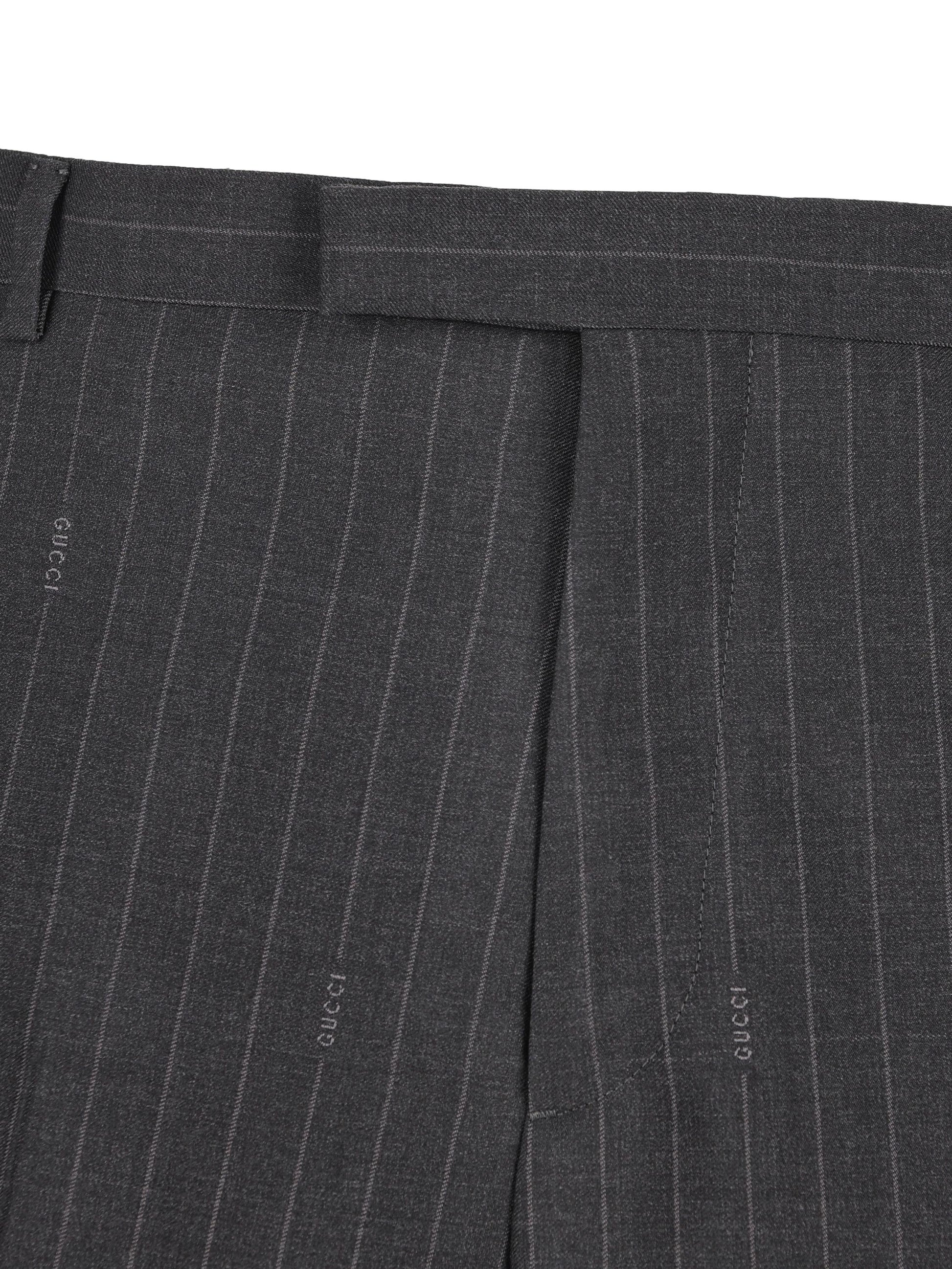 Pantaloni in lana gessata. 814299 Z7AQF1128 GUCCI 