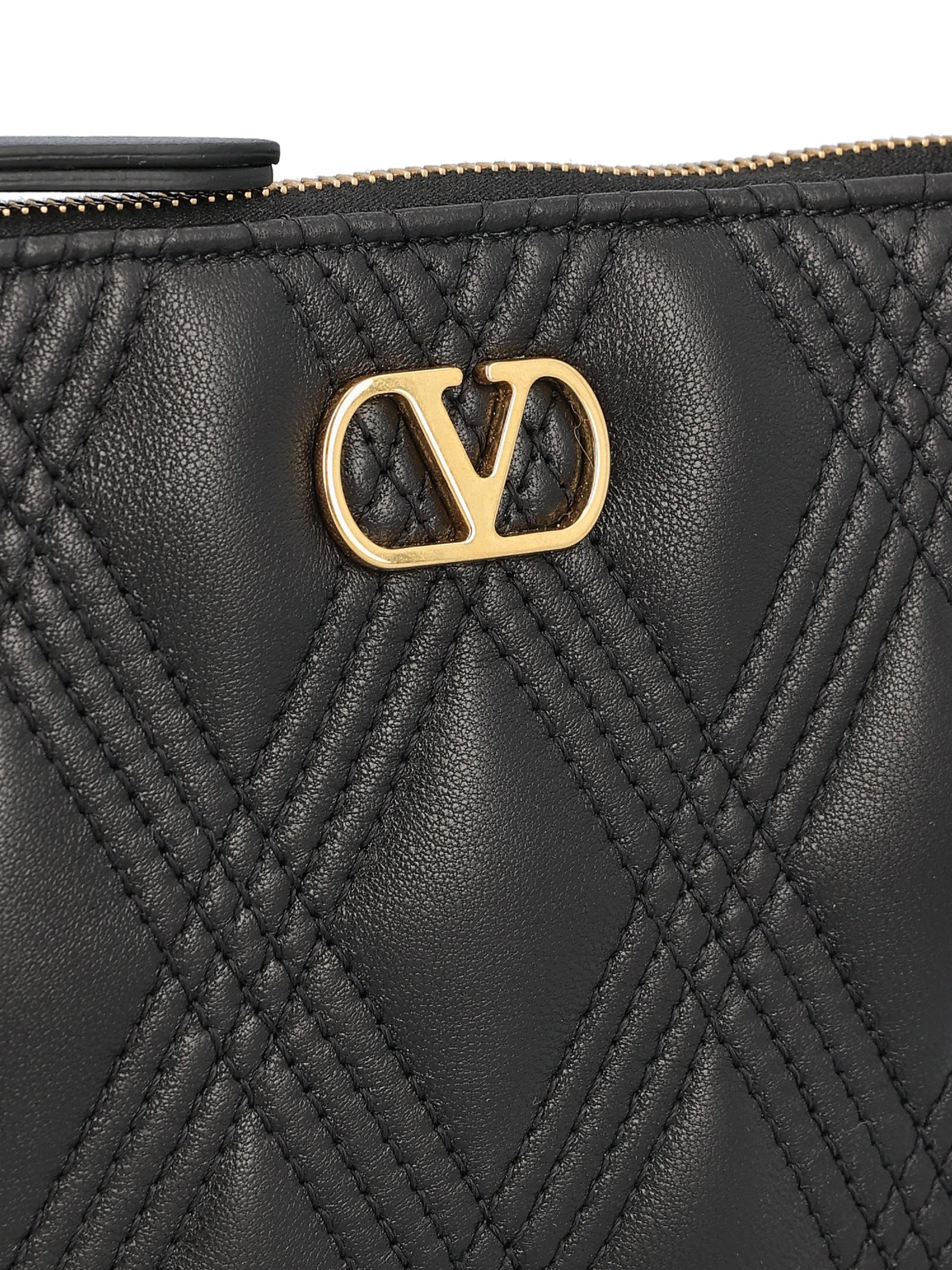 Pouch realizzata in pelle di agnello. 7W2P0AR7MIC 0NO VALENTINO GARAVANI 