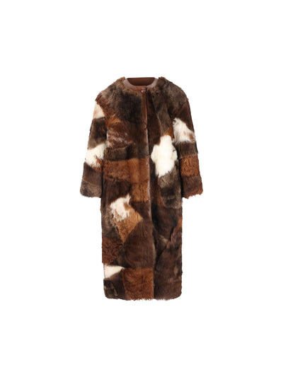 Cappotto realizzato in pelliccia di montone. 56A194 170TF0IDS PRADA 