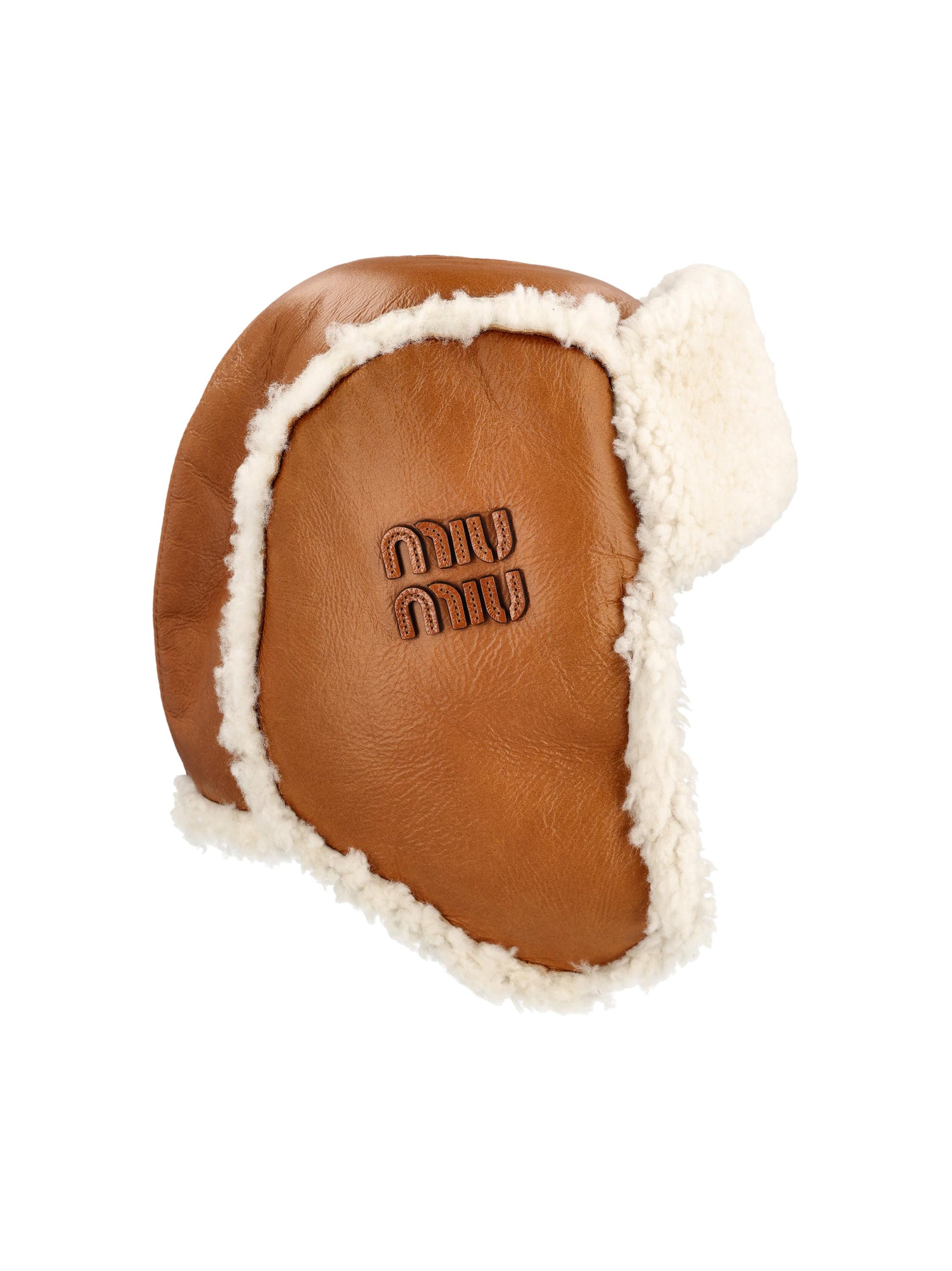 Cappello realizzato in pelle e shearling. 5HC398 2CTTF036S MIU MIU 