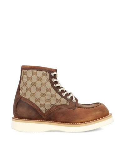 Stivale realizzato in pelle di vitello e tessuto. 831149 AAEZE2541 GUCCI 