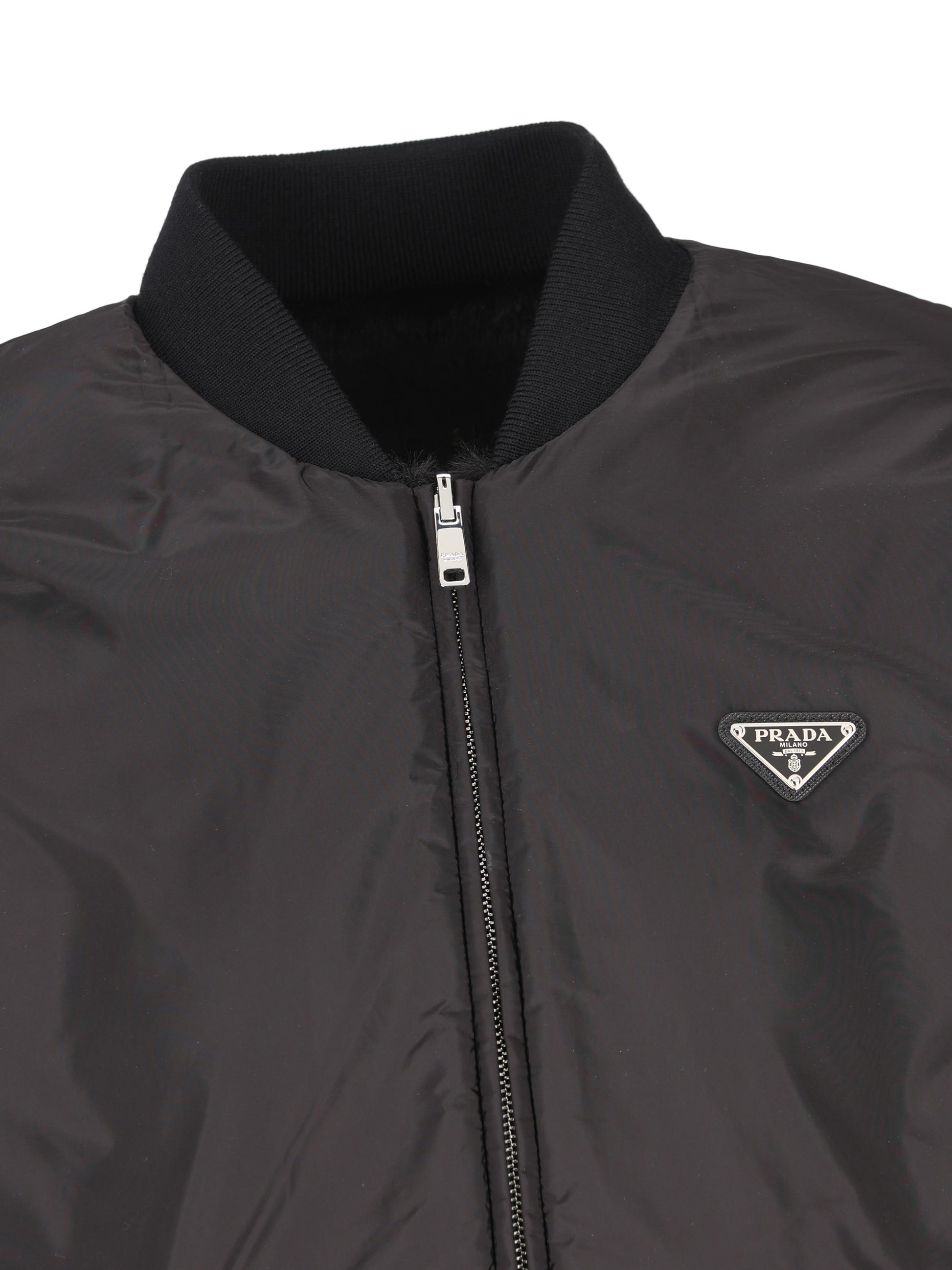 Giacca reversibile realizzata in poliestere e poliammide riciclata. PZV015 12DHF0002 PRADA 