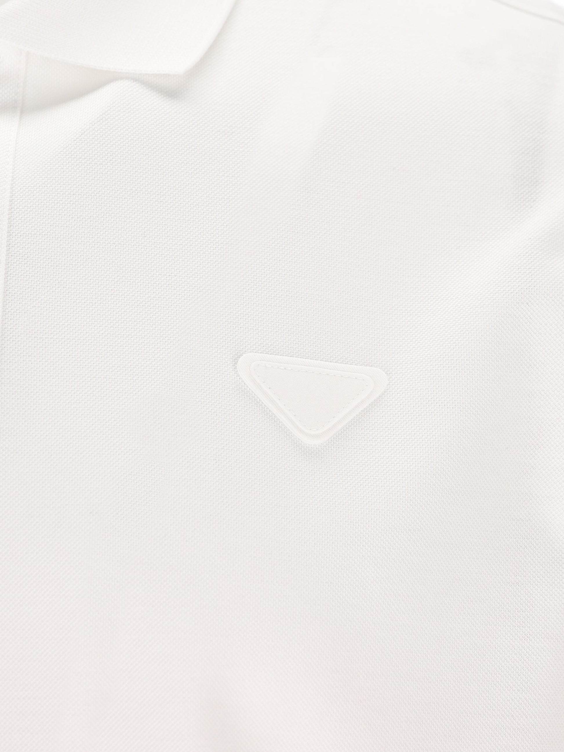 Polo realizzata in cotone. UJN444 1867F0009 PRADA 