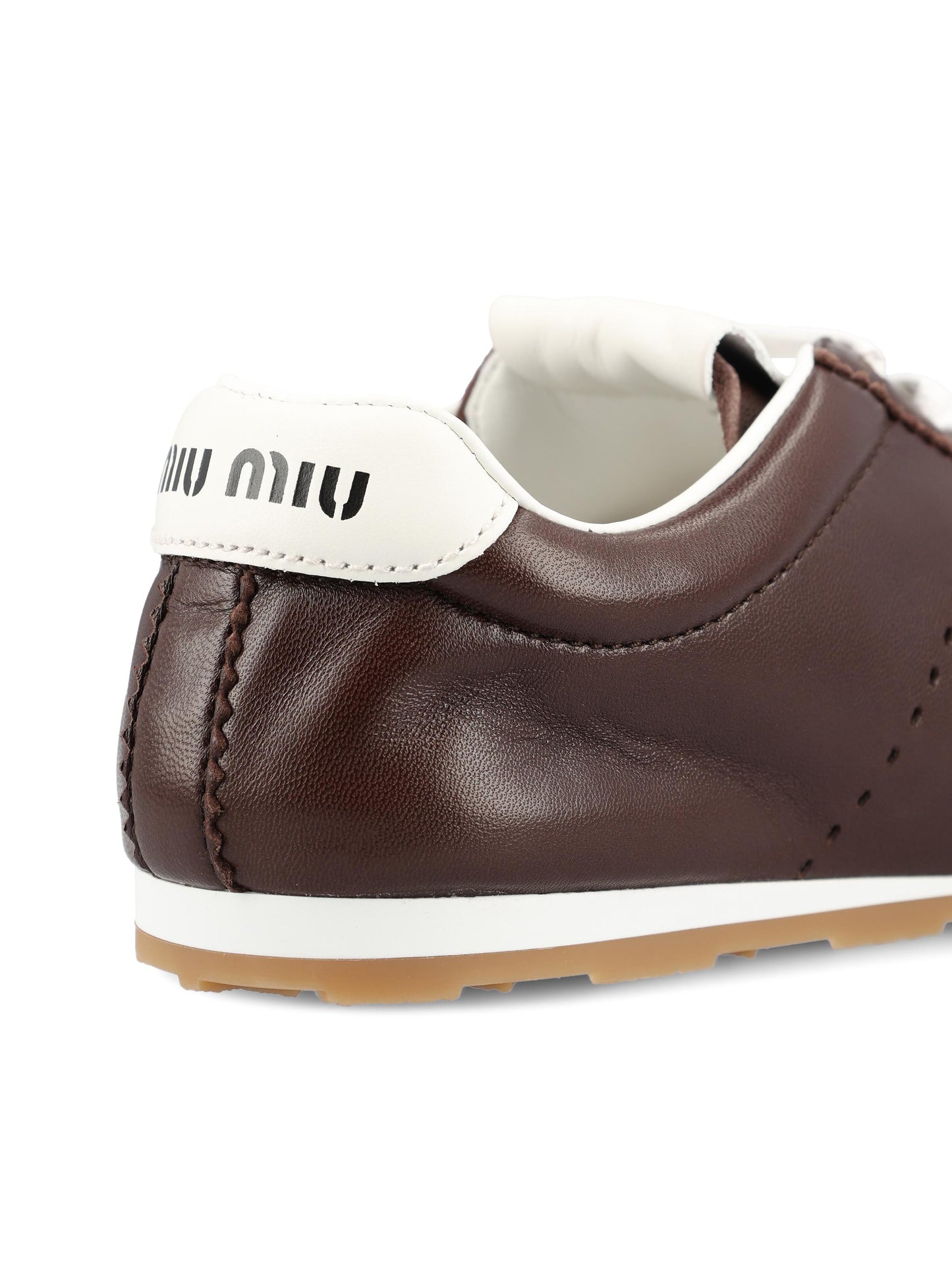 Sneakers realizzate in pelle. 5E114E 79NF0003 MIU MIU 