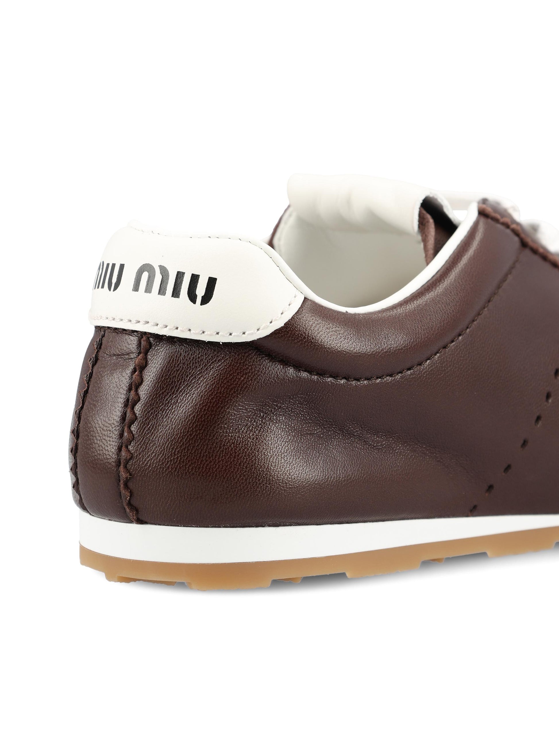 Sneakers realizzate in pelle. 5E114E 79NF0003 MIU MIU 