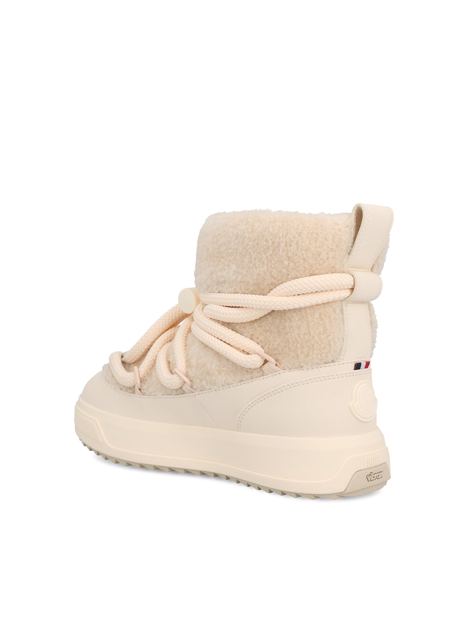 Stivali realizzati in pile effetto teddy e poliuretano. W4H00010 M945721I MONCLER 