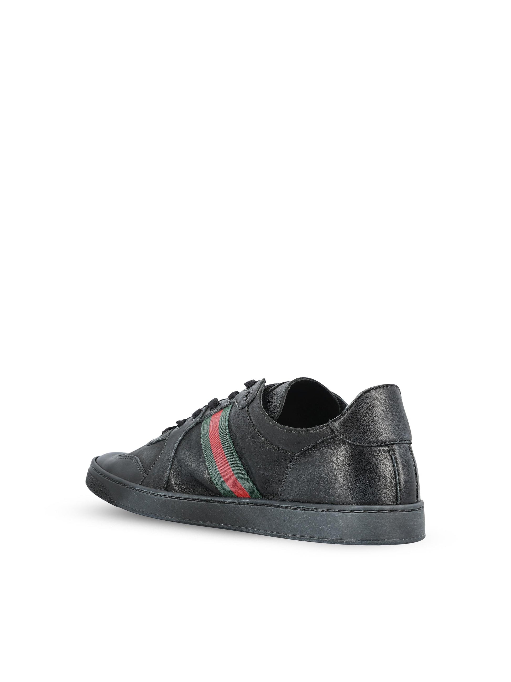 Sneakers realizzate in pelle. 865441 AAGFF1048 GUCCI 