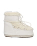 Stivali realizzati in ecopelliccia. 80D1409390 A002 MOON BOOT 