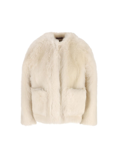 Giacca realizzata in pelliccia di agnello. 835453 XSAGQ9020 GUCCI 