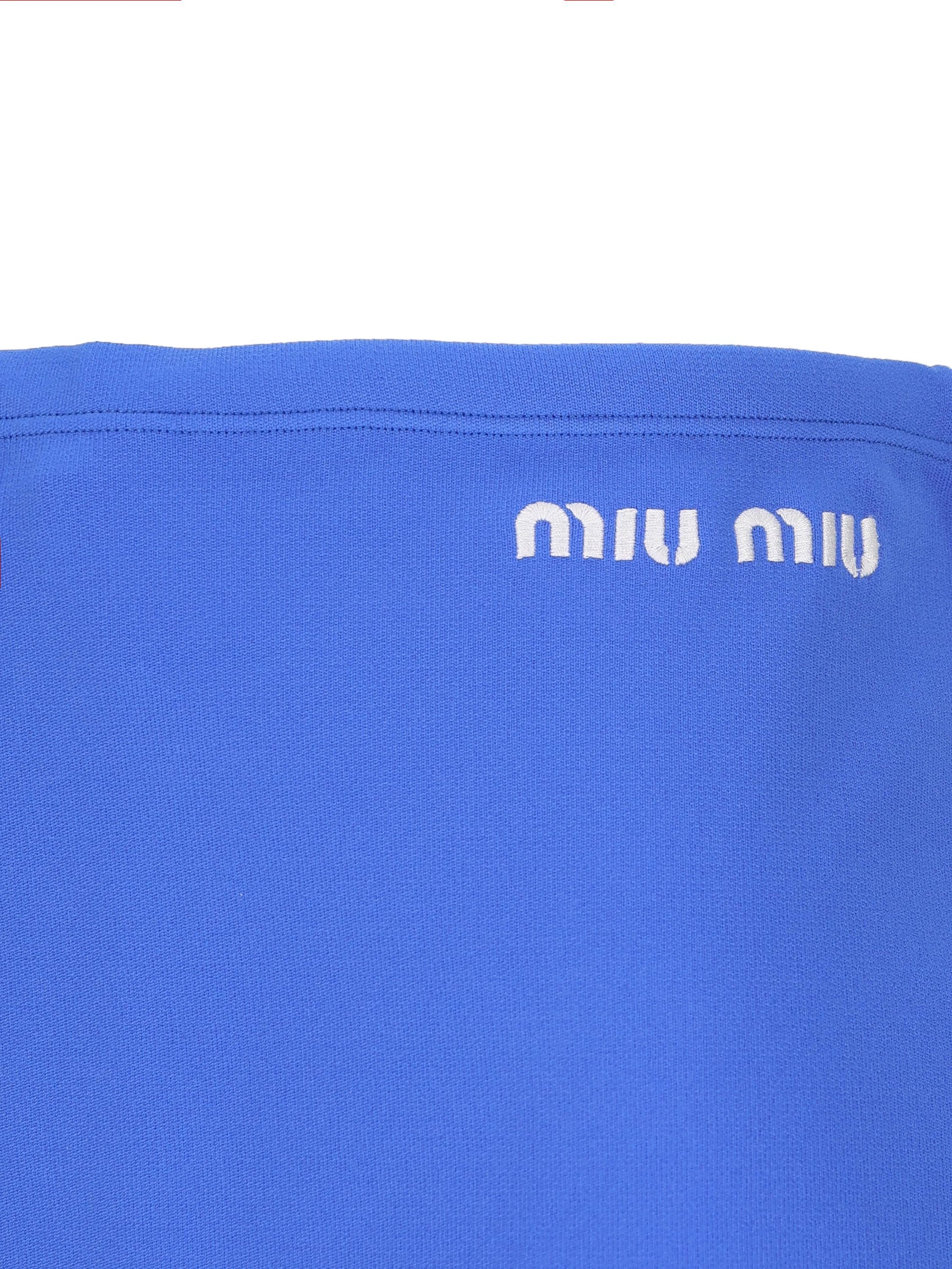 Minigonna realizzata in poliammide riciclata. MMG584 148OF0Q0U MIU MIU 