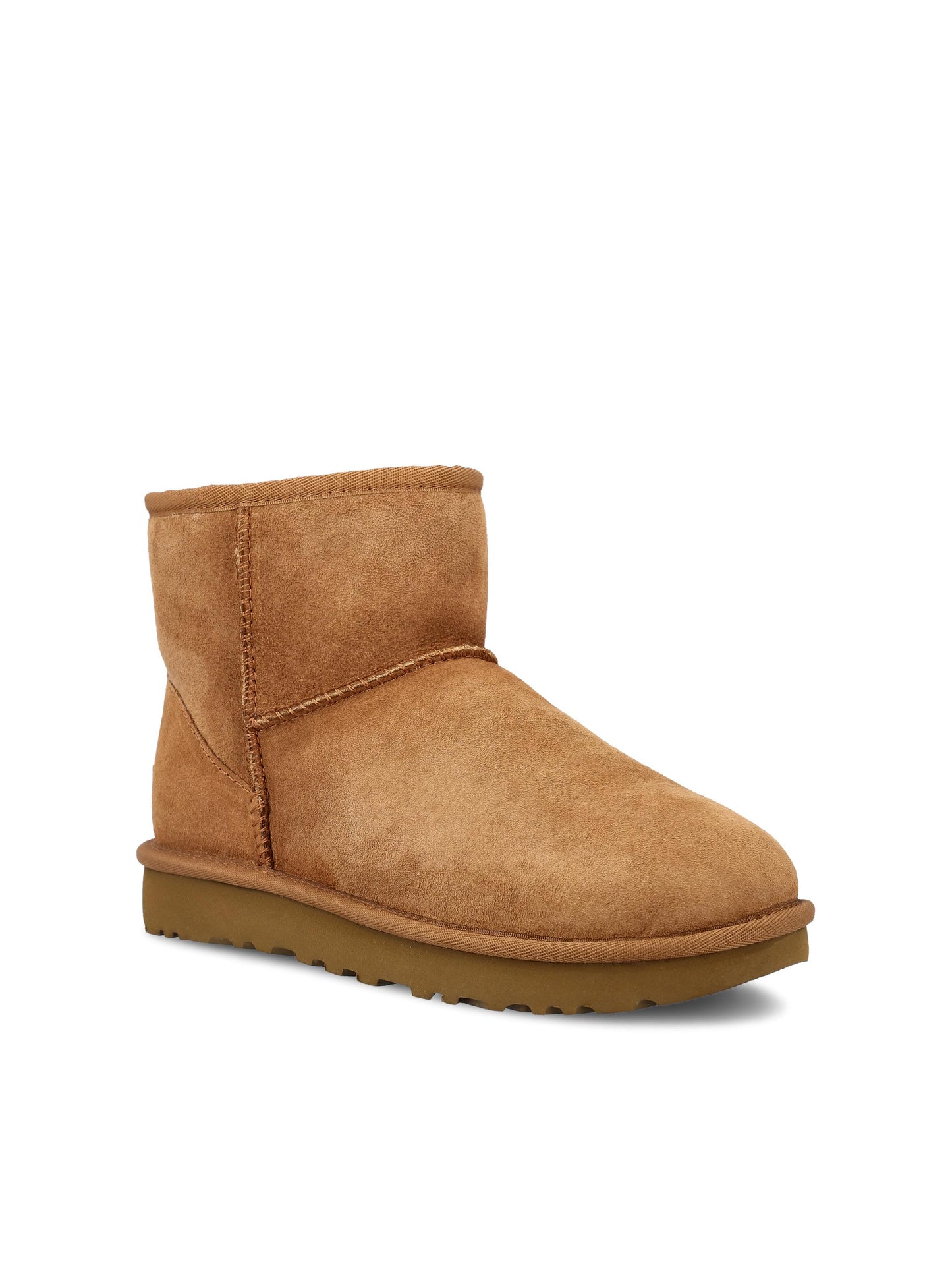 Stivali realizzati in montone e pelle. 1016222 CHE UGG 