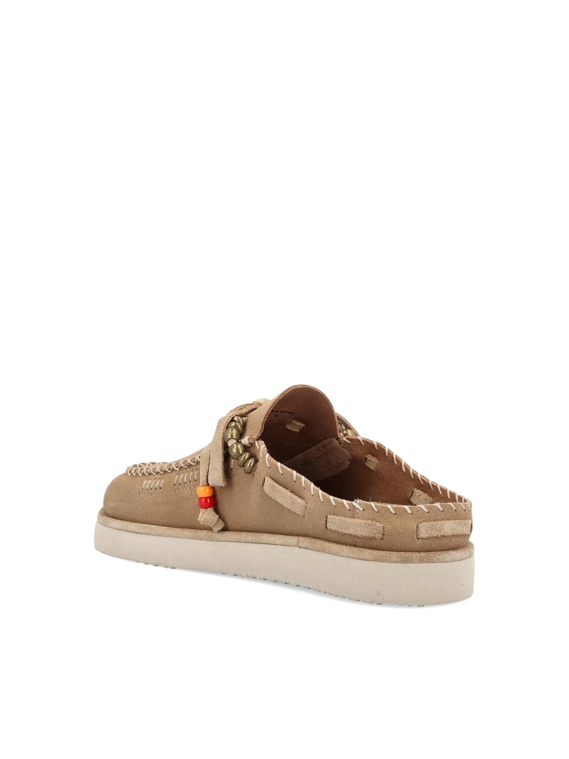 Mules realizzate in pelle. Mules Fourrées Beige CALEB 